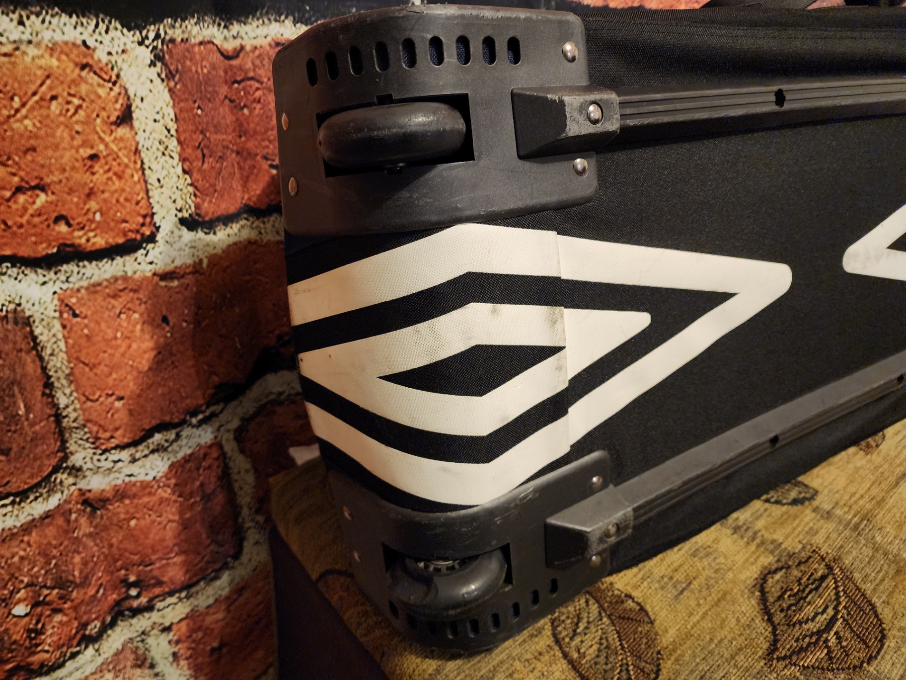 Blue Umbro duffel bag and black wheeled gear case - image 2 of 11