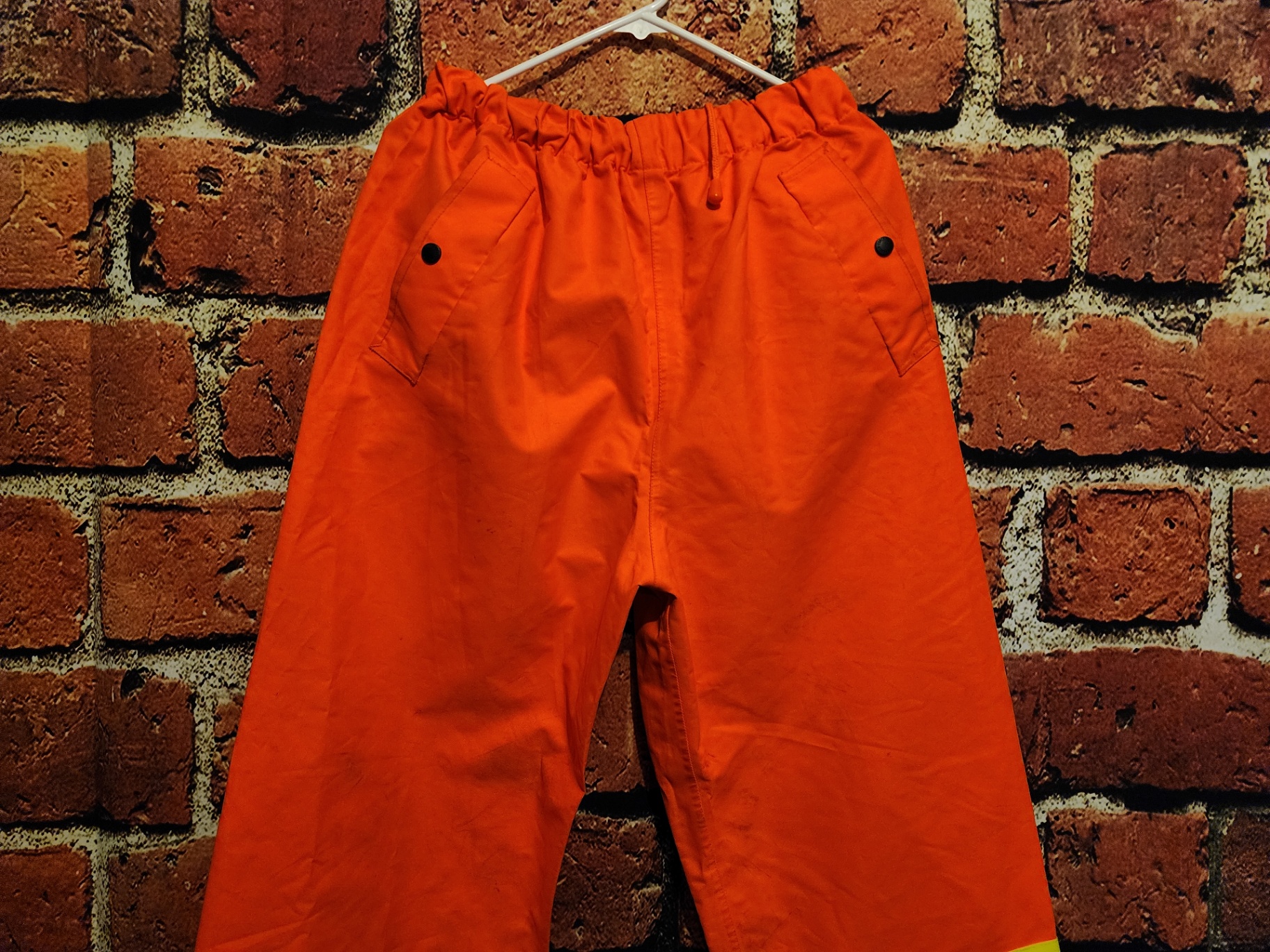 Orange high-visibility safety pants with reflective bands - image 8 of 9