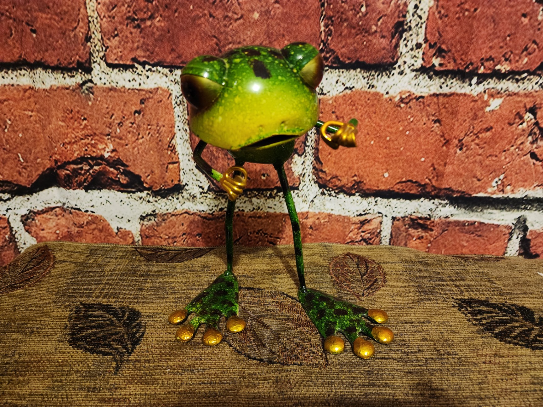 Green metal frog sculpture with gold accents - image 1 of 6