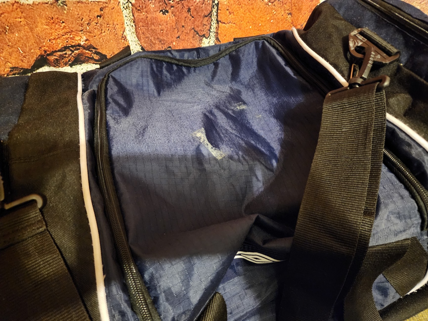 Blue Umbro duffel bag and black wheeled gear case - image 5 of 11