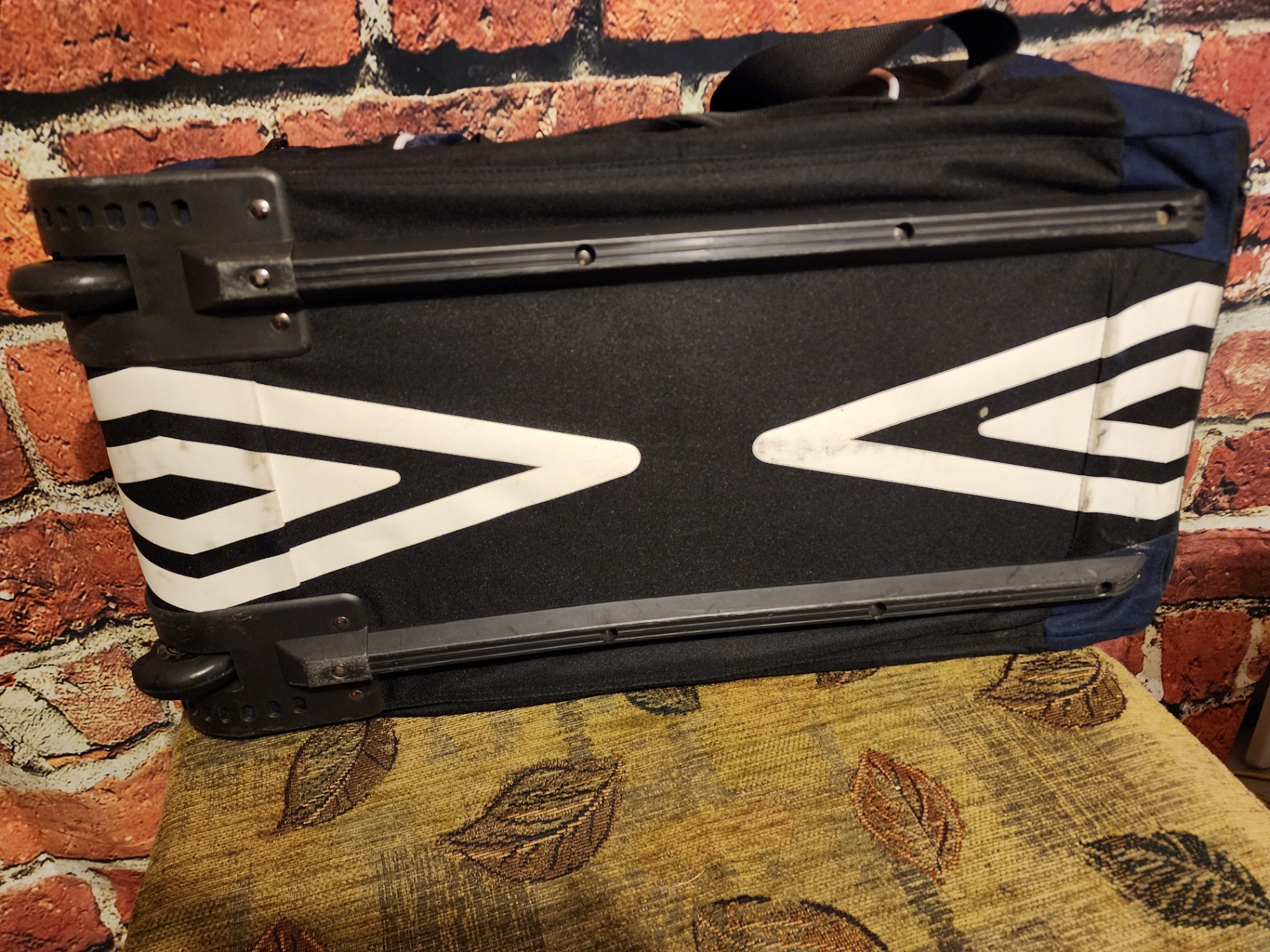 Blue Umbro duffel bag and black wheeled gear case - image 11 of 11