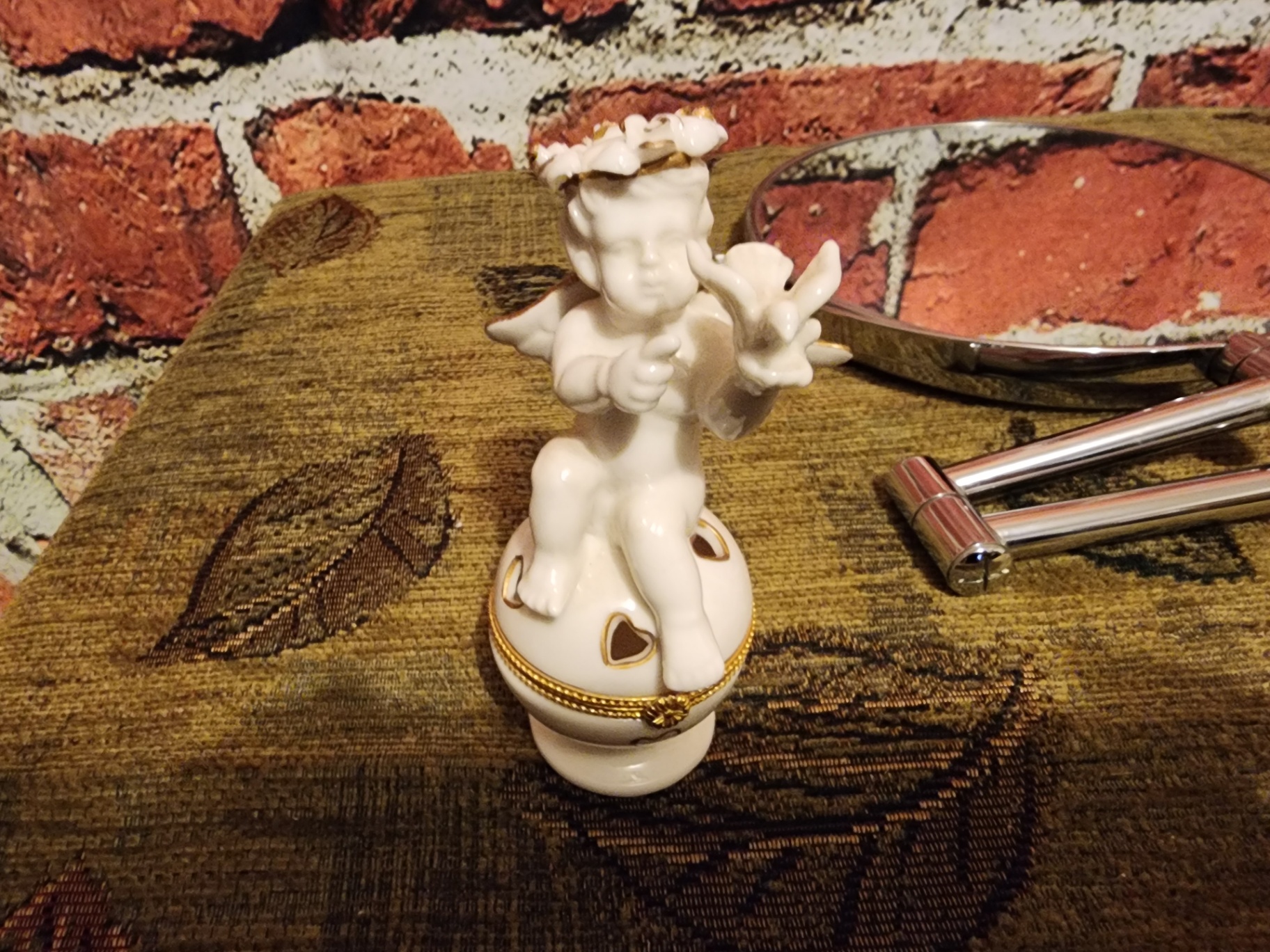 Round vanity mirror with porcelain angel figurine and decorative containers - image 6 of 8