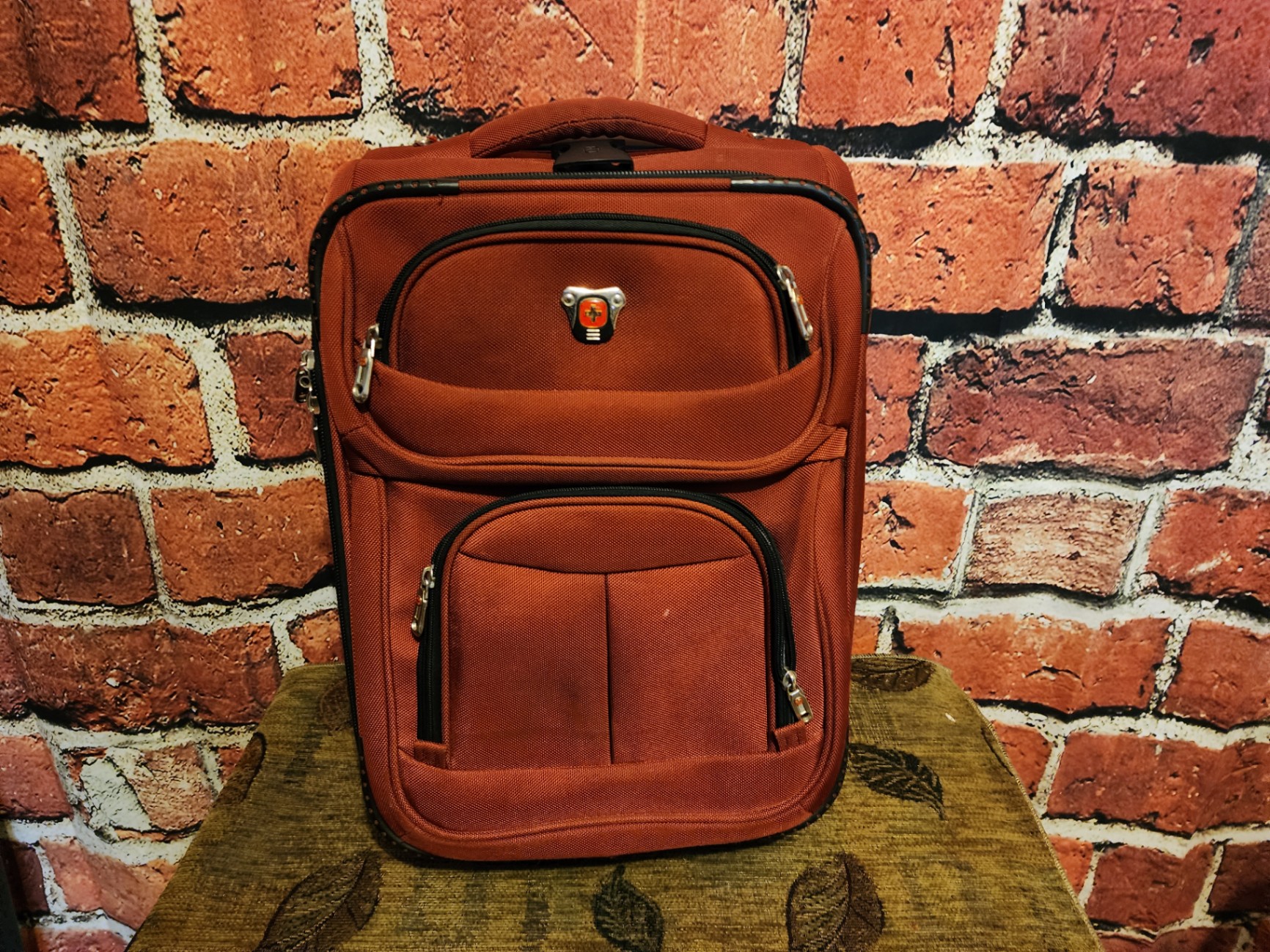 Black wheeled base, gray SwissGear red rolling suitcase - image 1 of 10