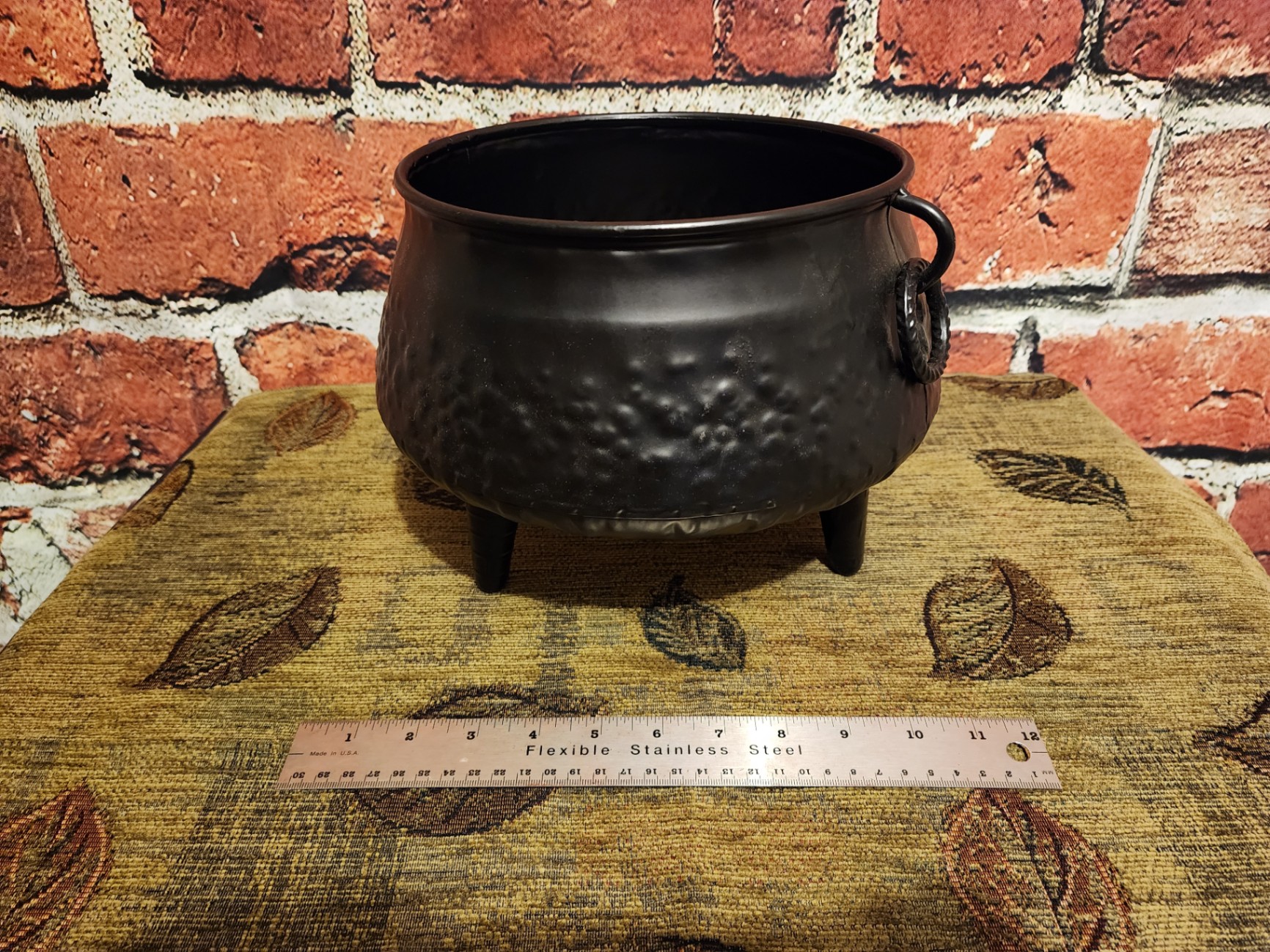 Hammered black cast iron cauldron with three legs - image 1 of 7