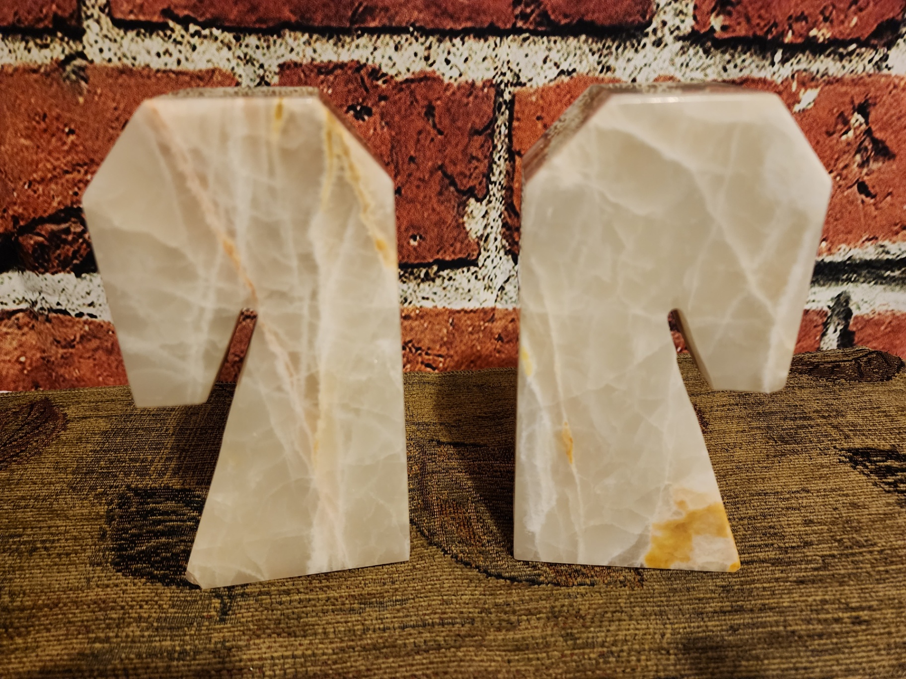 Pair of L-shaped stone bookends - image 1 of 7