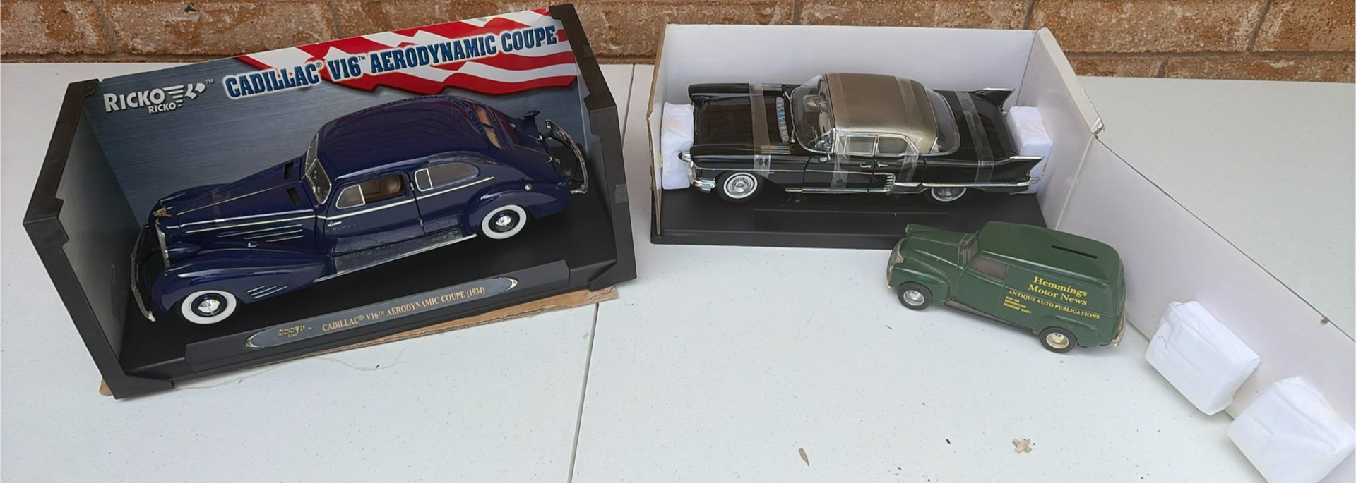Vintage die-cast car models and a Hemmings promotional van - image 1 of 5