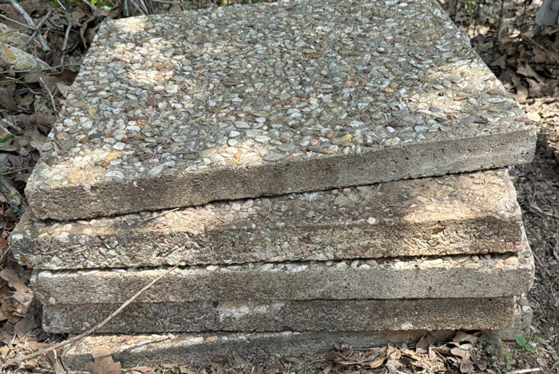 Stacked exposed-aggregate concrete slabs and stone pavers - image 3 of 5