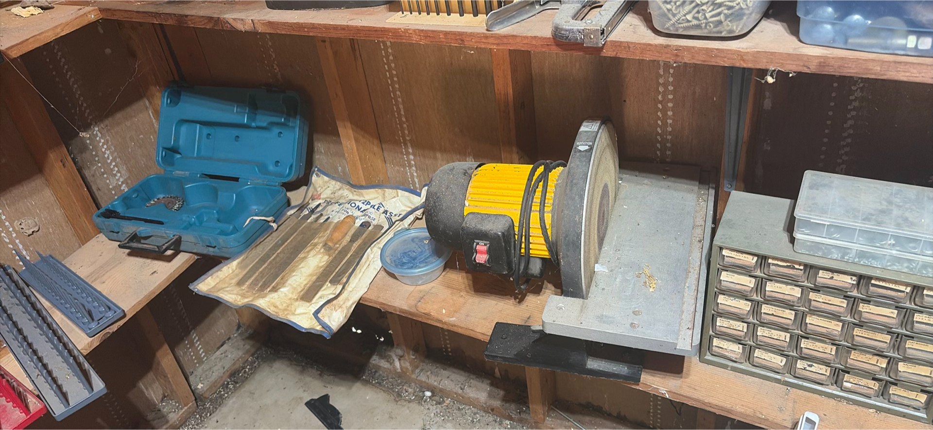 Garage workshop with power tools and hardware storage - image 9 of 18