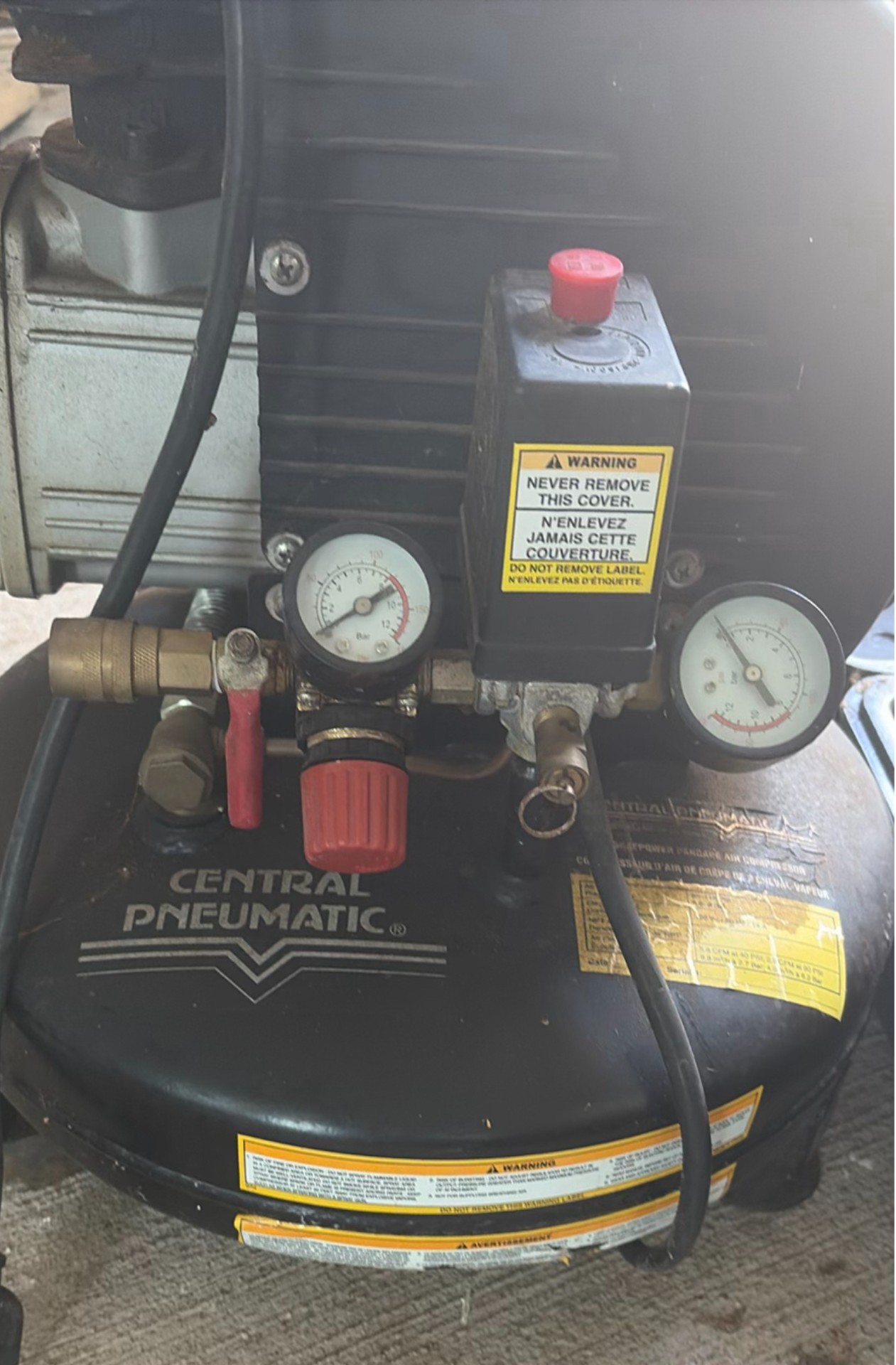 Air compressor and DeWalt circular saw with carrying cases - image 4 of 5
