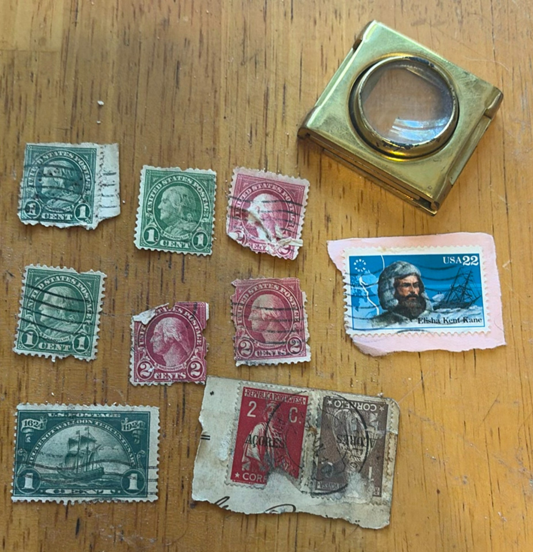 Vintage US stamps and brass magnifier - image 1 of 4