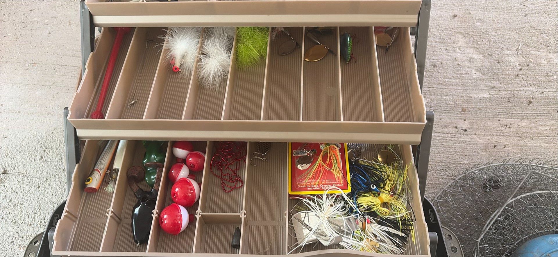 Fishing tackle box with lures and fishing rods - image 4 of 13