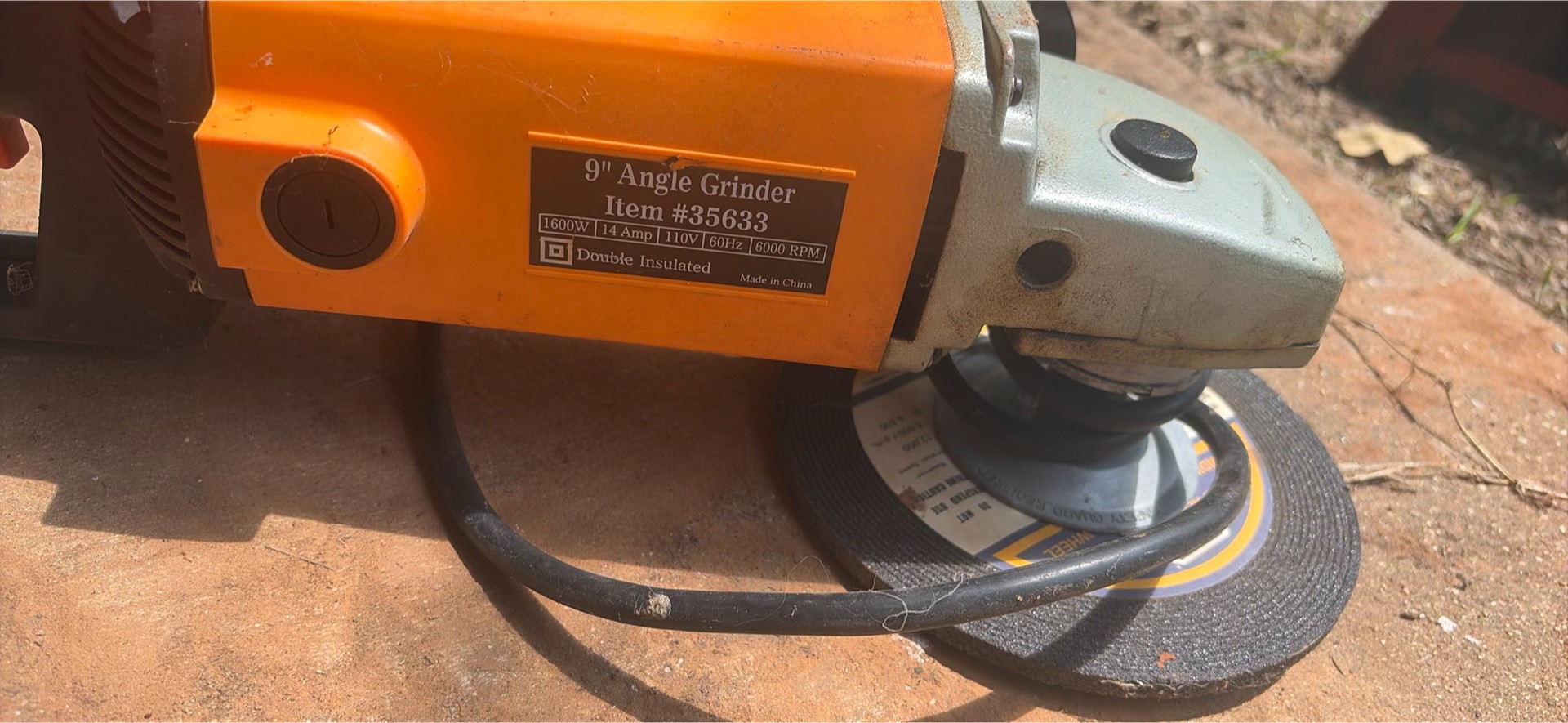 Angle grinder, air filter kit, and assorted tool cases - image 5 of 8