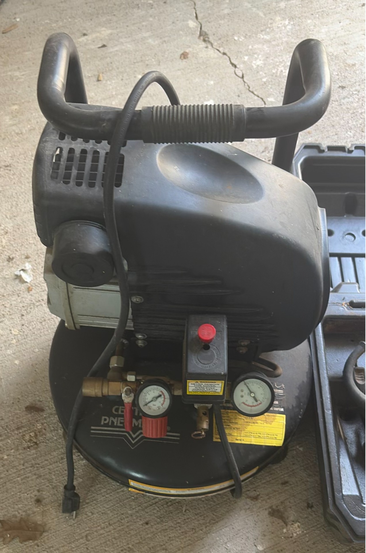 Air compressor and DeWalt circular saw with carrying cases - image 3 of 5