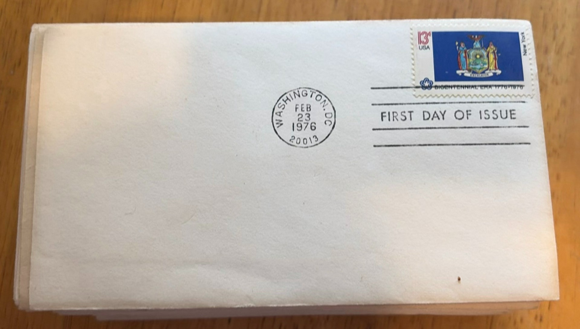 First Day of Issue stamp covers and a stack of envelopes - image 2 of 4