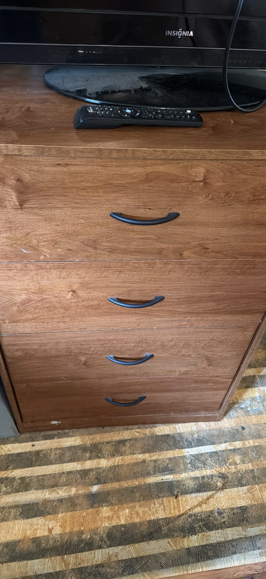 Insignia flat-screen TV with built-in DVD player on wooden dresser - image 5 of 5