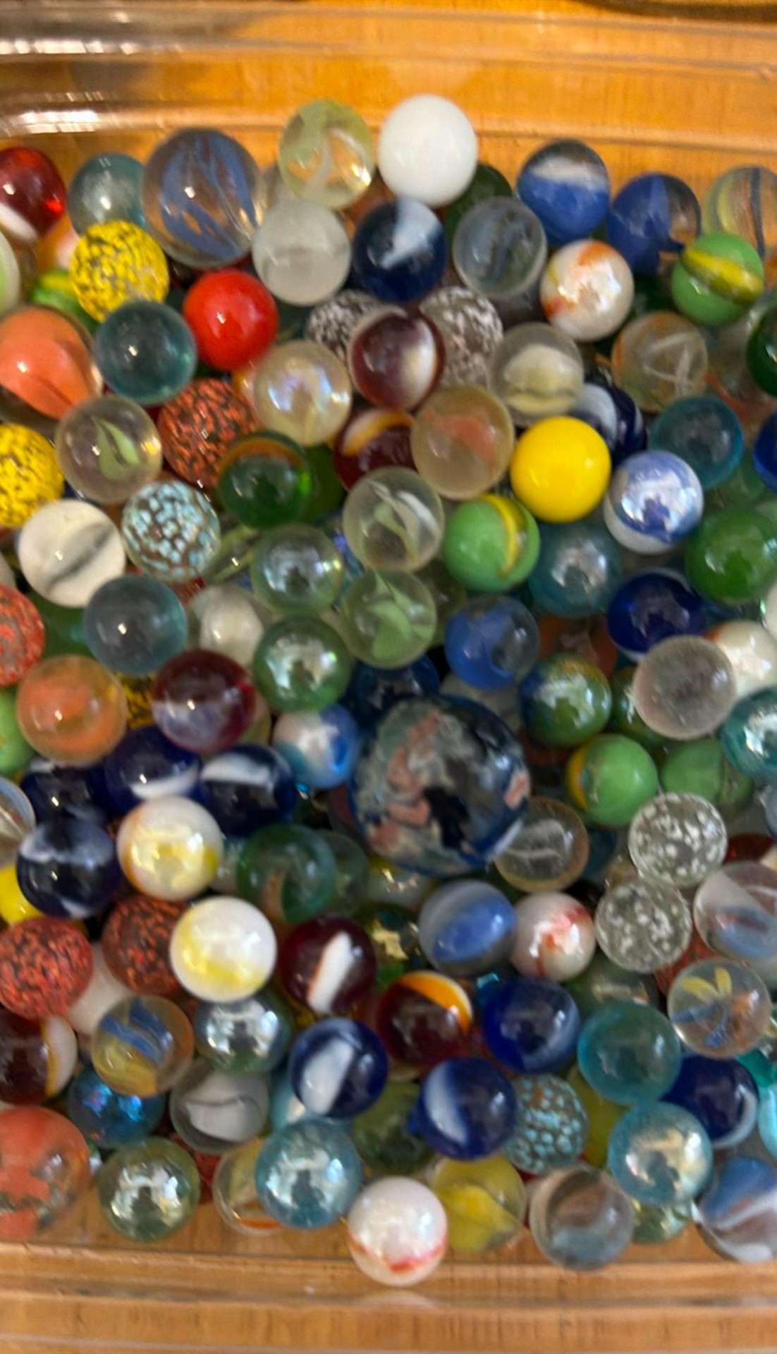 Assorted glass marbles in jars, bowls, and bottles - image 3 of 5