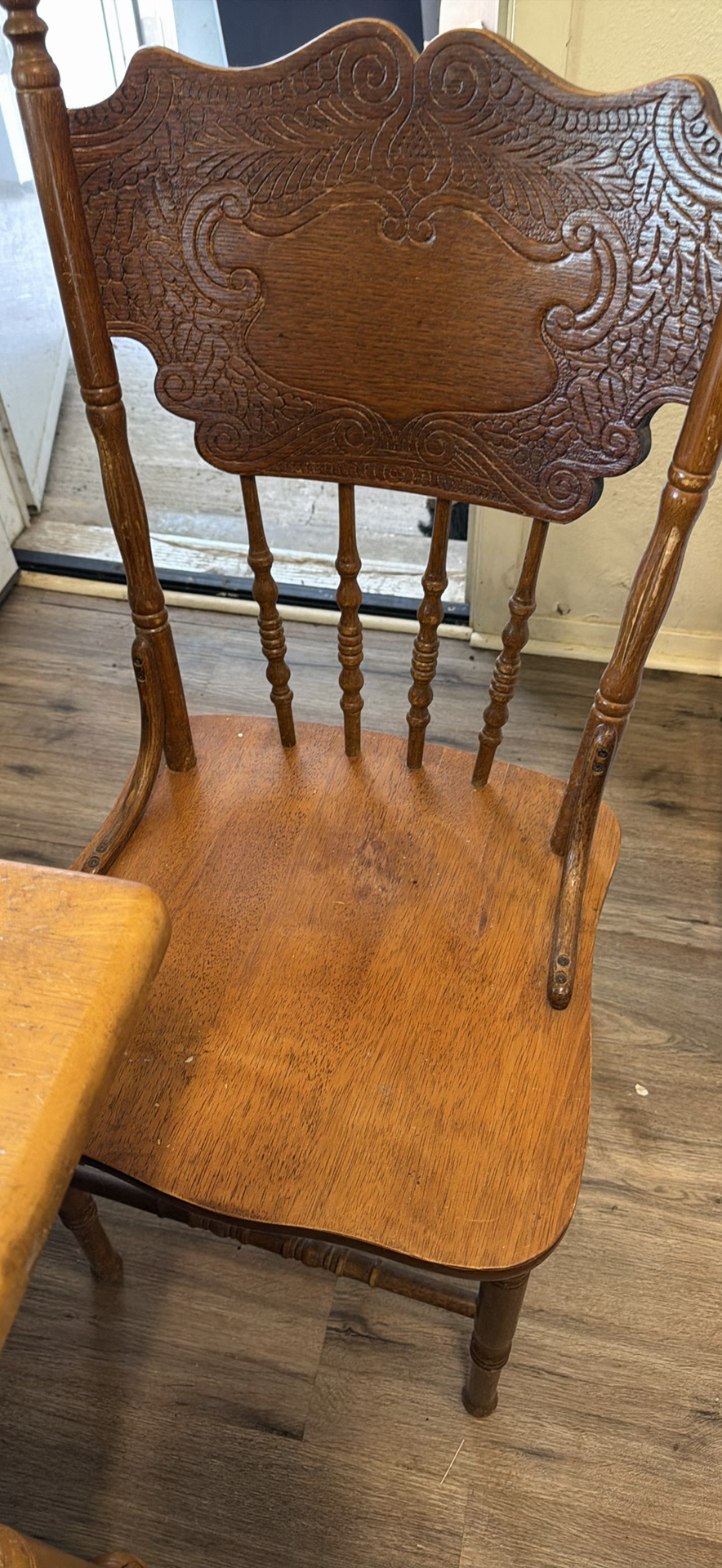 Wooden dining table with carved-back chairs - image 3 of 4