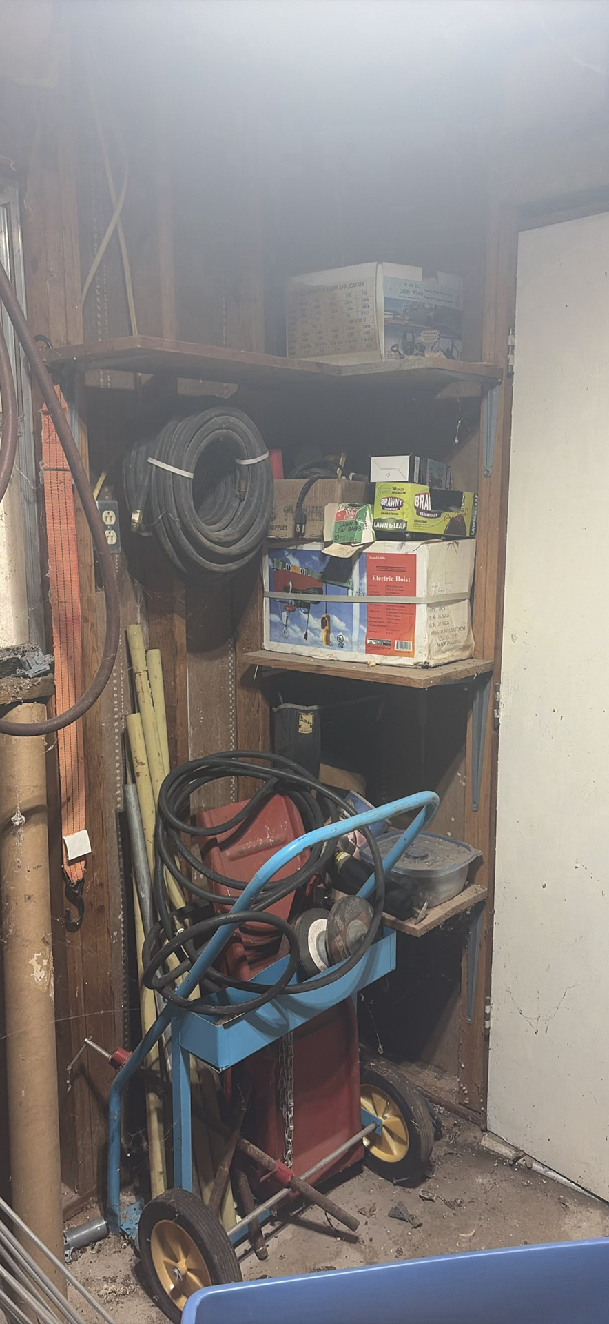 workshop tools with hoses, cords, and hardware - image 1 of 13