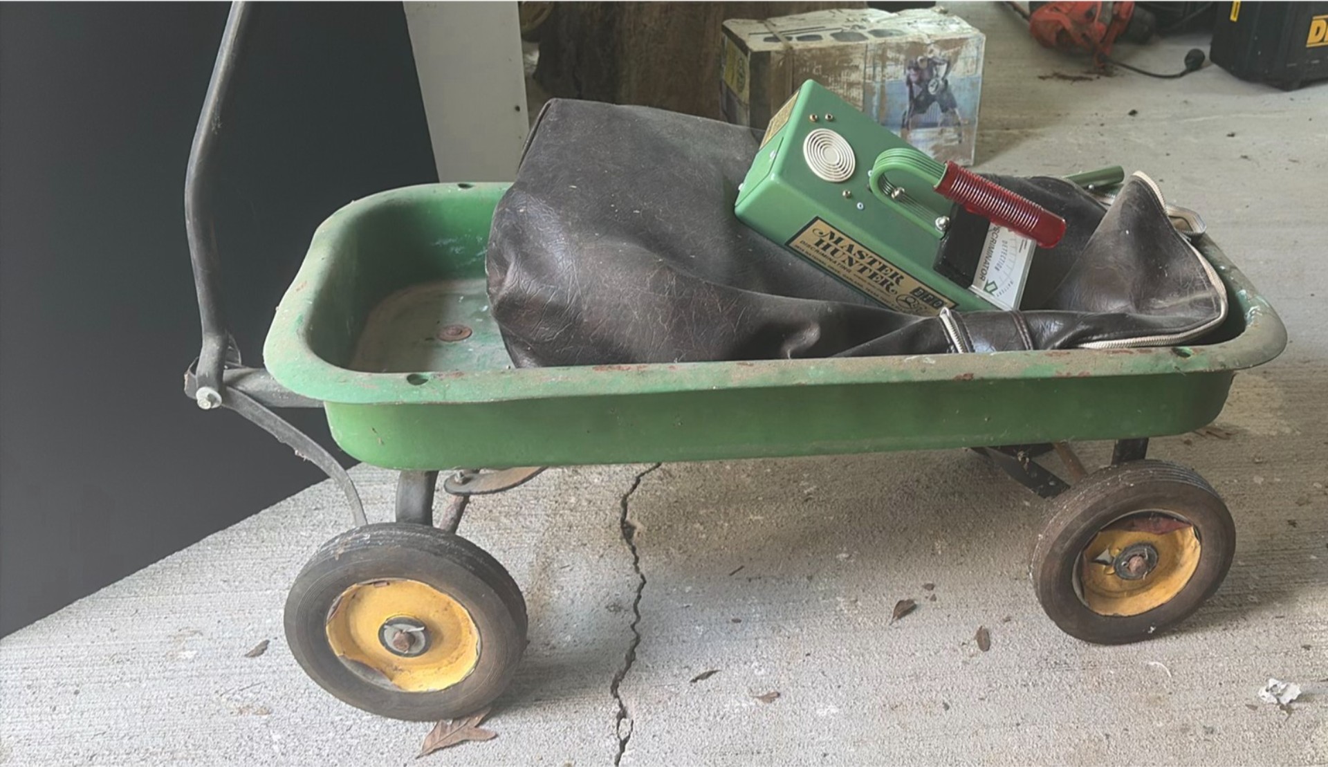 Green wagon with vintage Master Hunter metal detector - image 1 of 4
