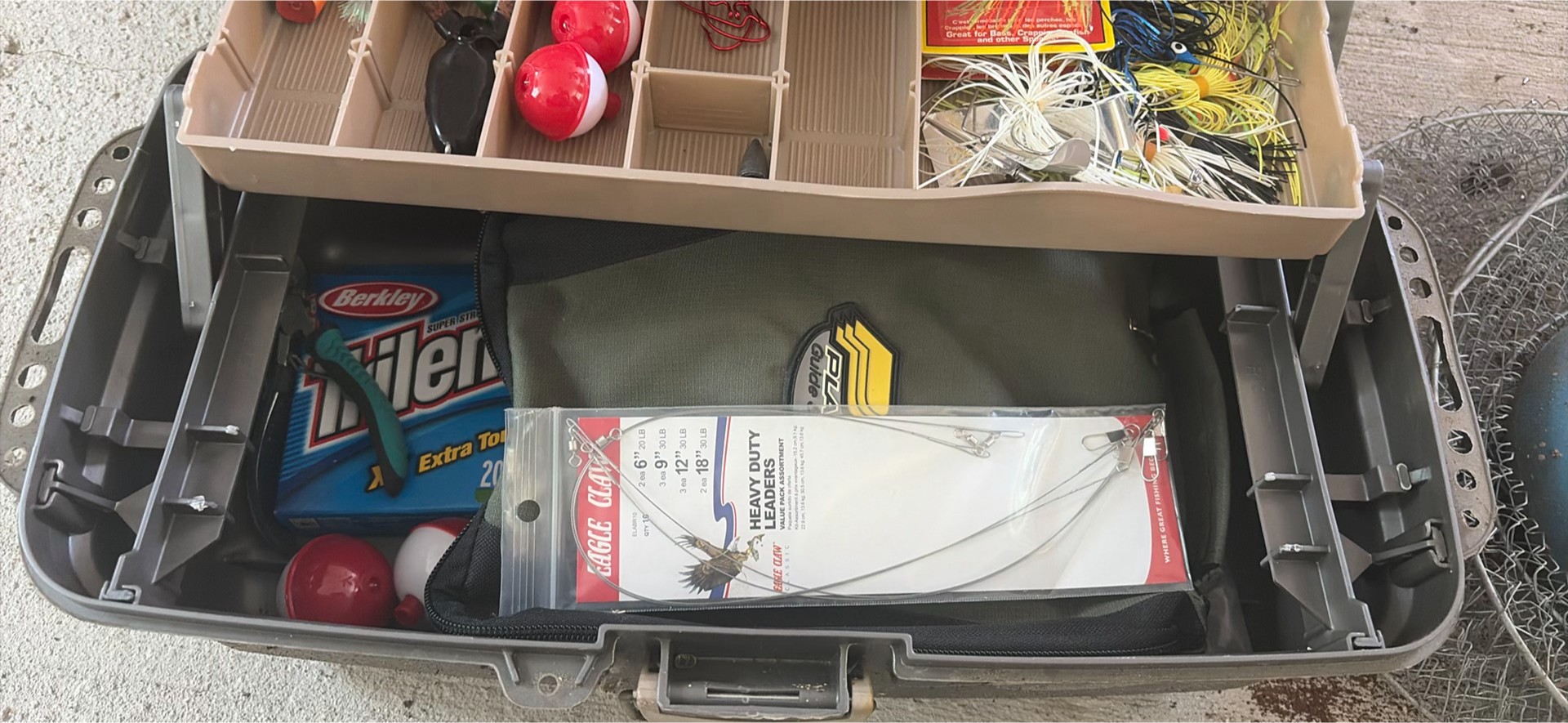 Fishing tackle box with lures and fishing rods - image 3 of 13