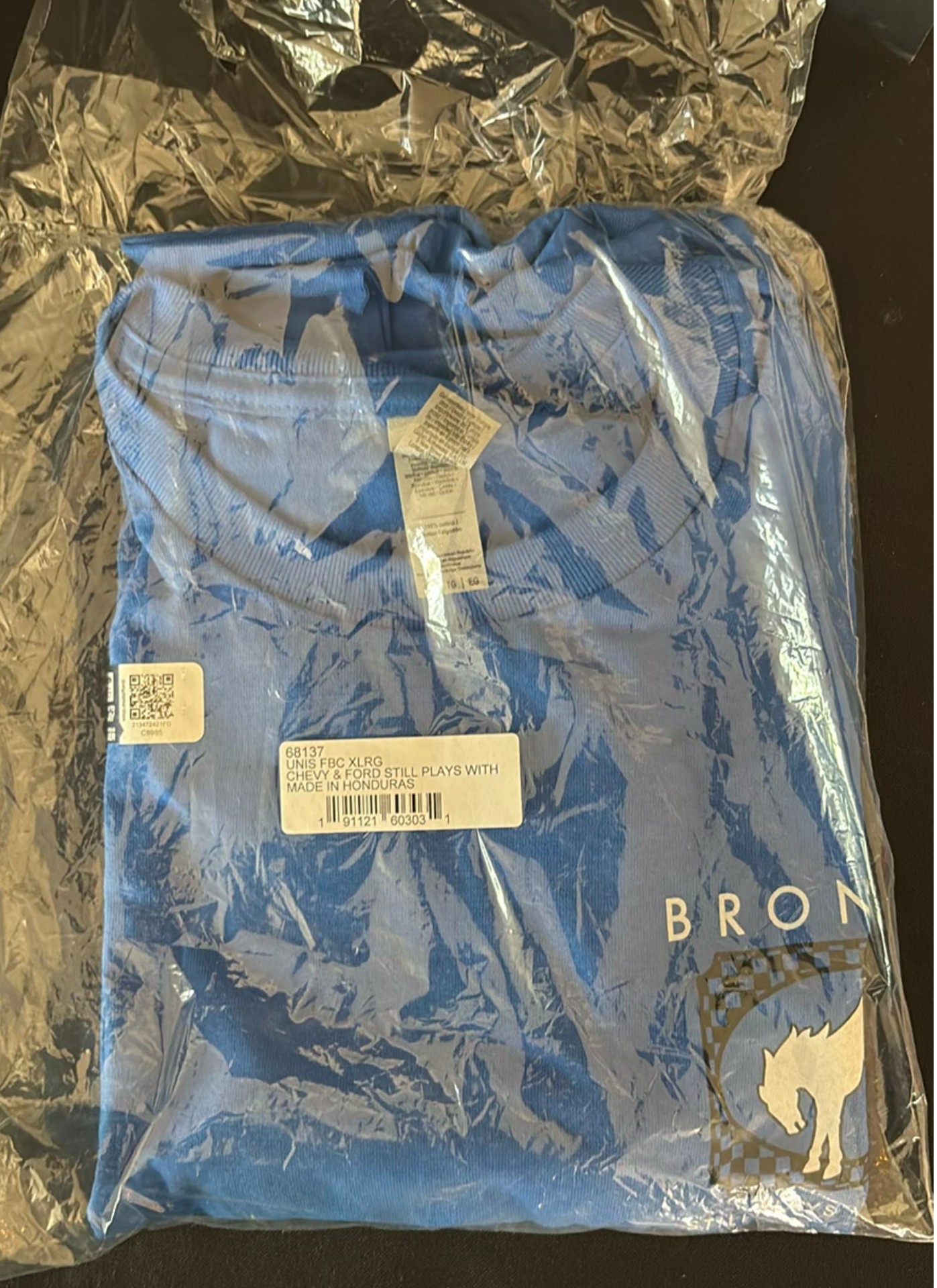 Blue packaged garment, embroidered satin caftan, patterned scarf, and woven wall hanging - image 1 of 4