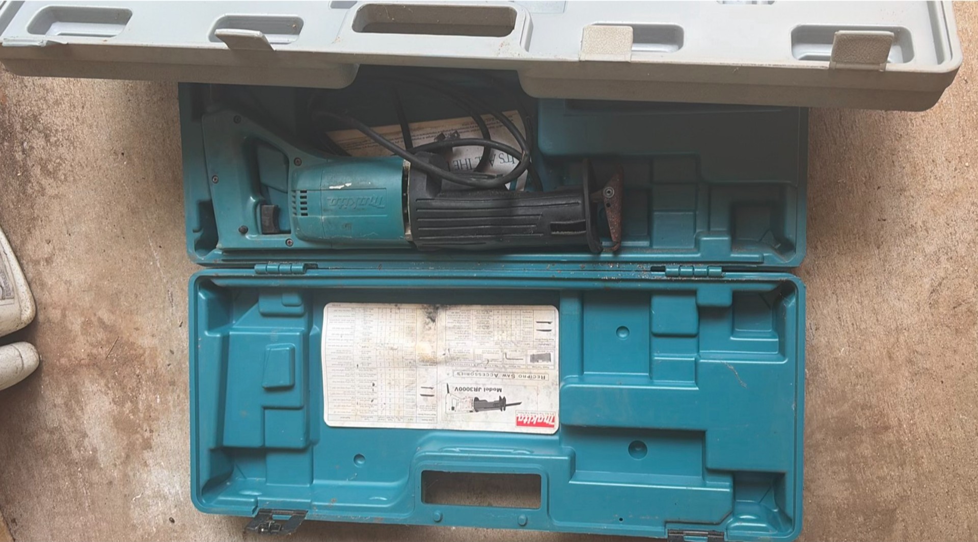Angle grinder, air filter kit, and assorted tool cases - image 1 of 8