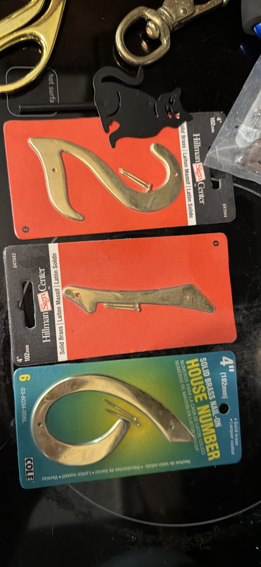 Assorted hardware items including brass hooks and carabiner - image 2 of 5