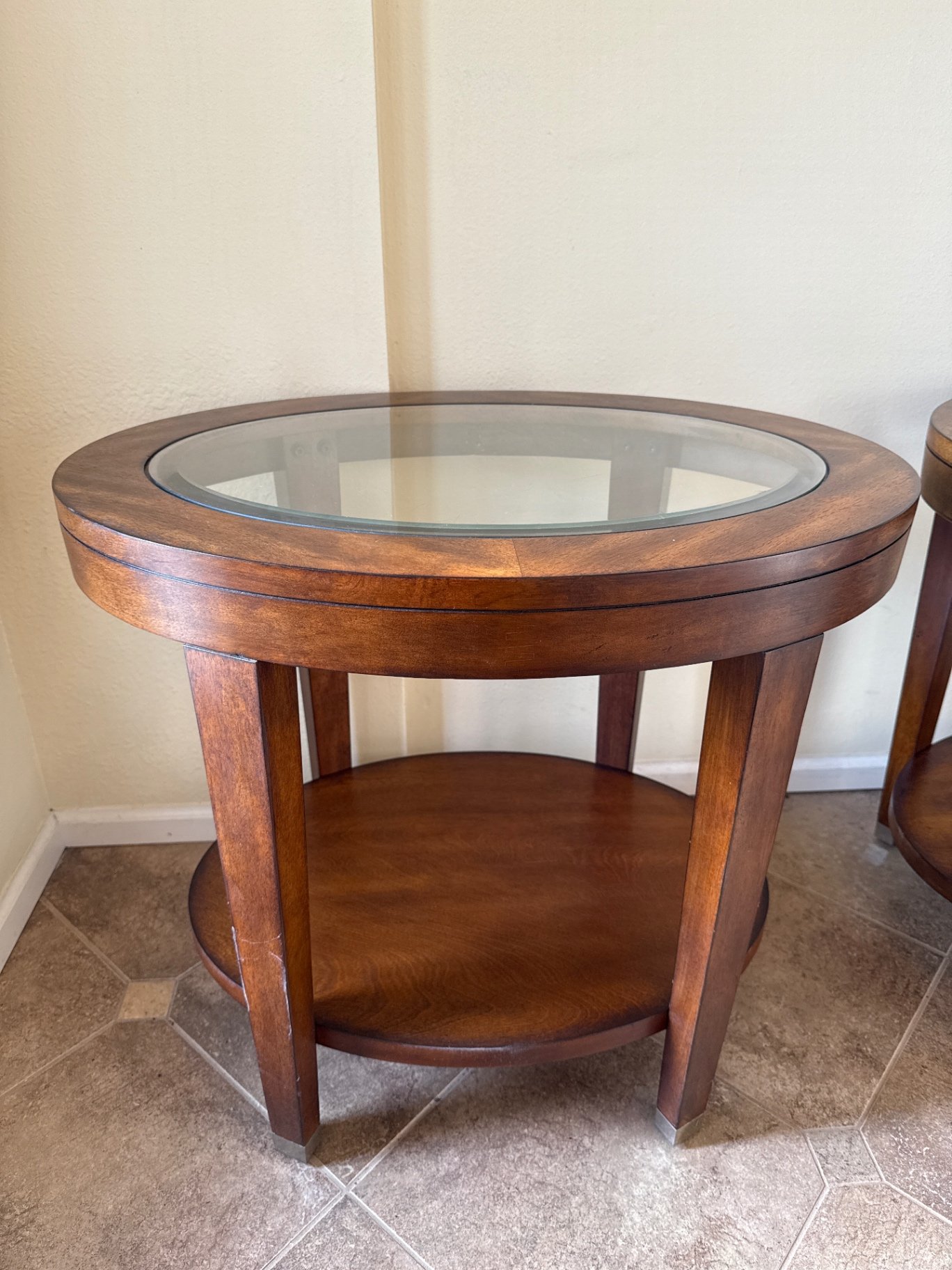 Pair of round wood end tables with glass tops - image 2 of 3