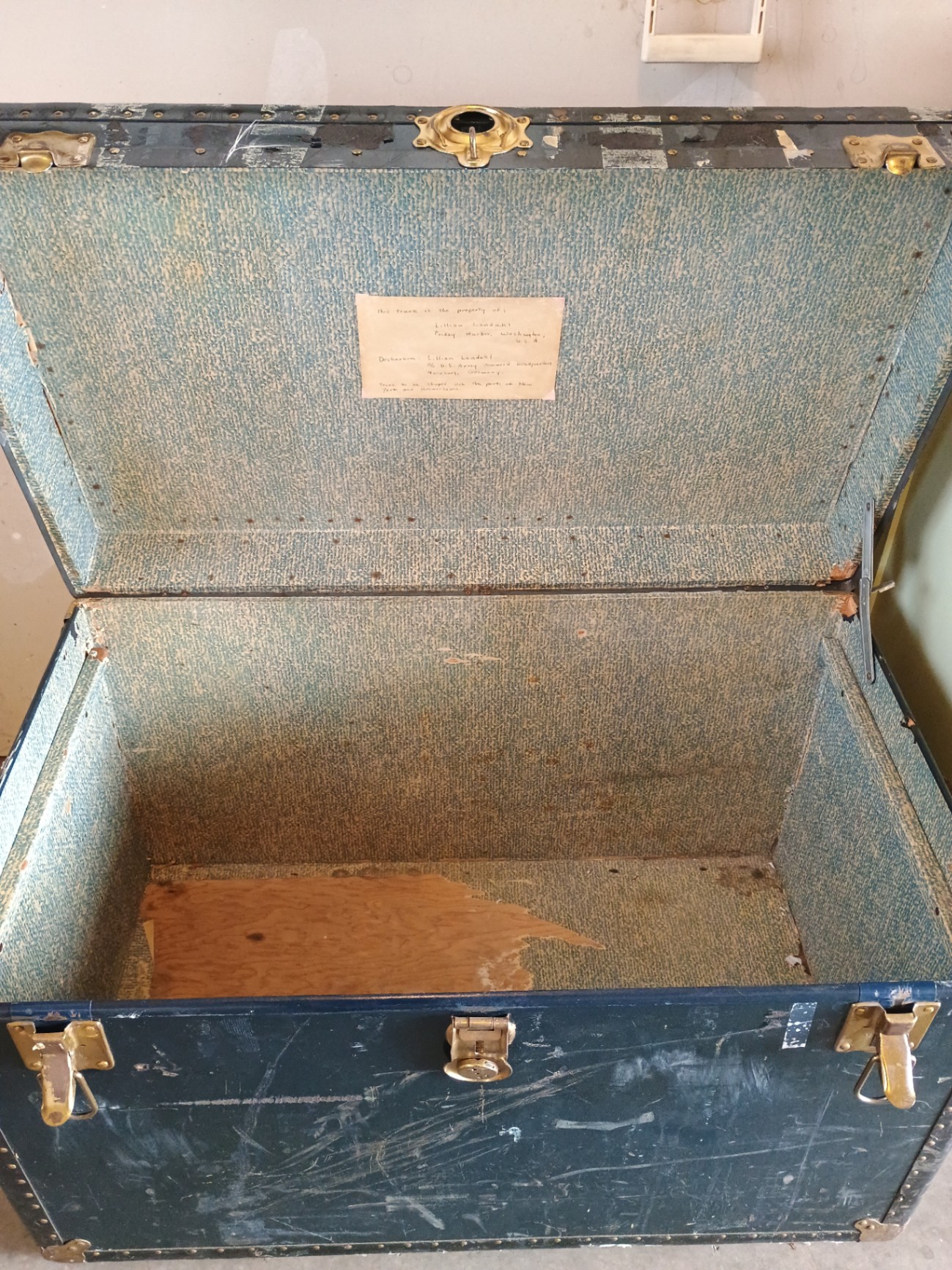 Vintage riveted metal trunk with blue stenciled markings - image 2 of 7