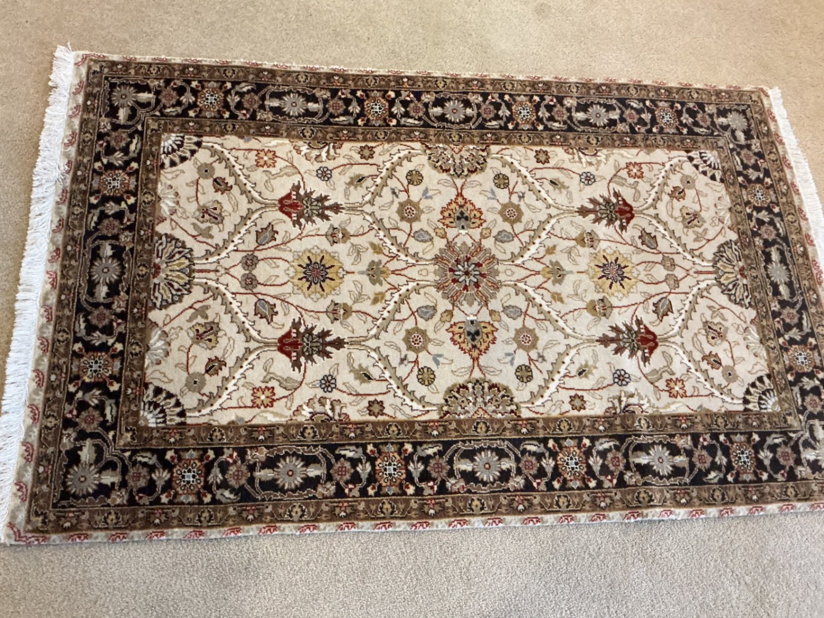 Small ‘Persian’ area rug - image 1 of 4