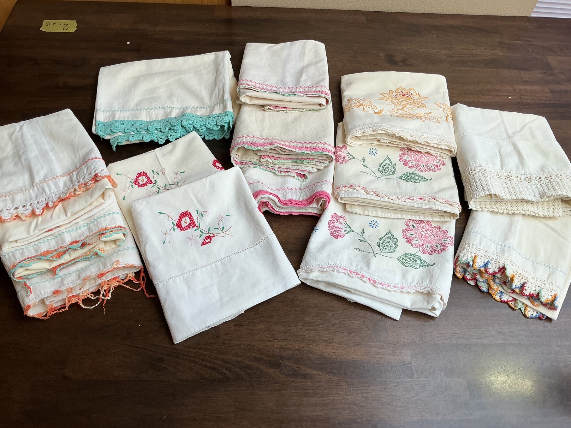 Vintage embroidered pillow cloths, crocheted doilies - image 1 of 5