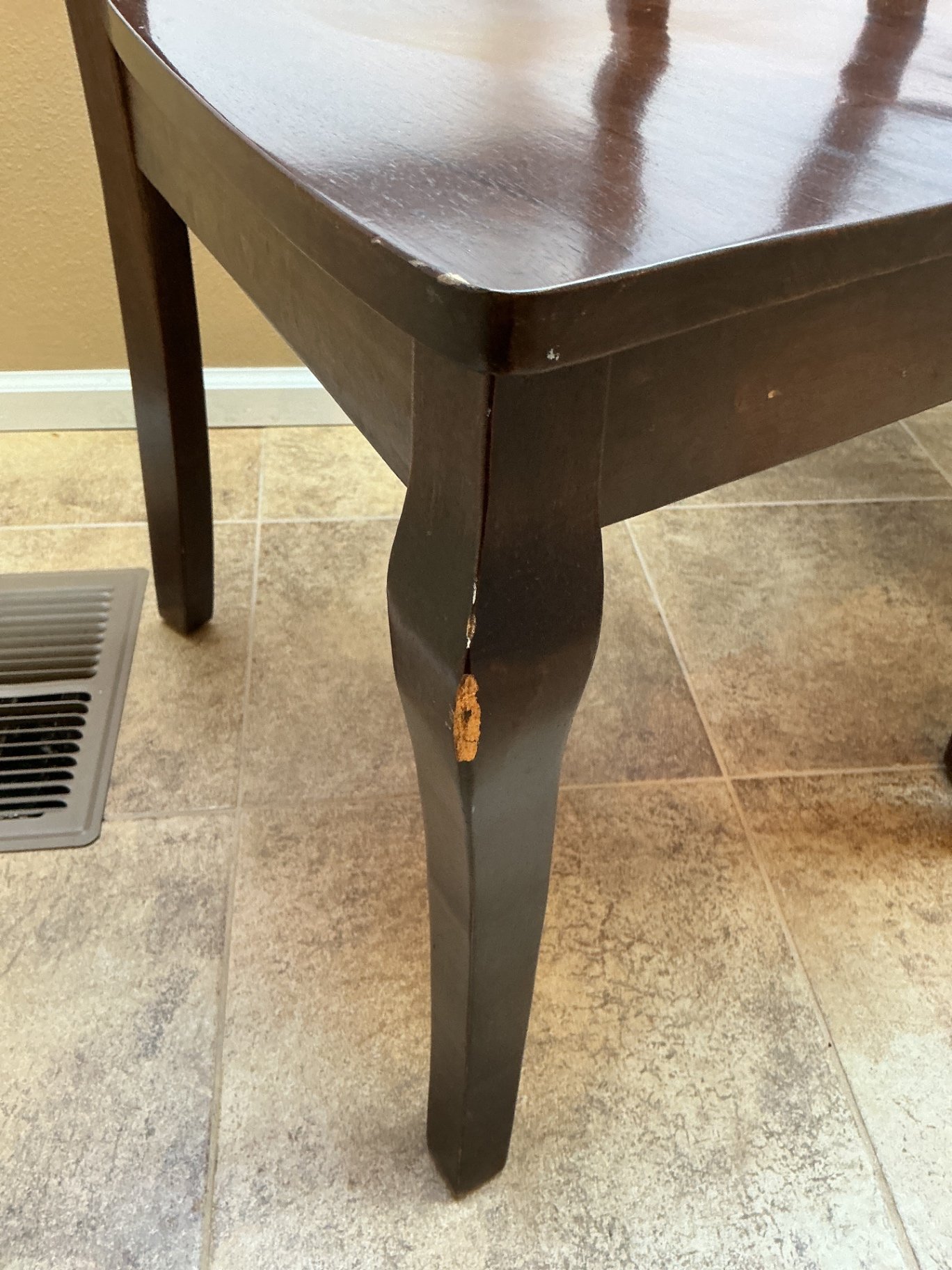 Dark wood dining table with four matching chairs - image 3 of 5