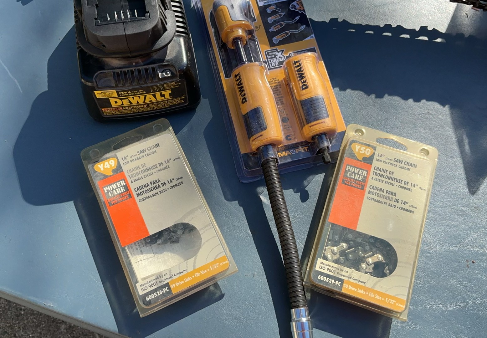 Two Chain Saws And Batteries - image 9 of 9