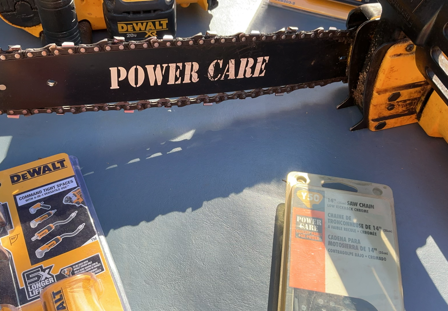 Two Chain Saws And Batteries - image 2 of 9