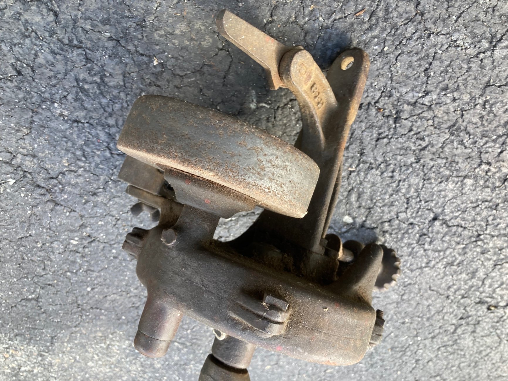 Rusty vintage hand-cranked workshop tool with wheel and clamp - image 1 of 6