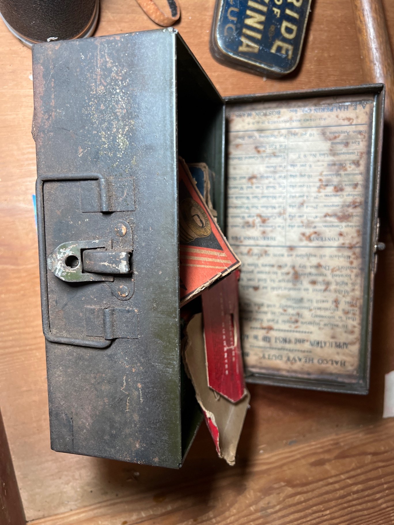 Vintage binoculars, fuse boxes, tobacco tin, and first-aid kit collection - image 8 of 9