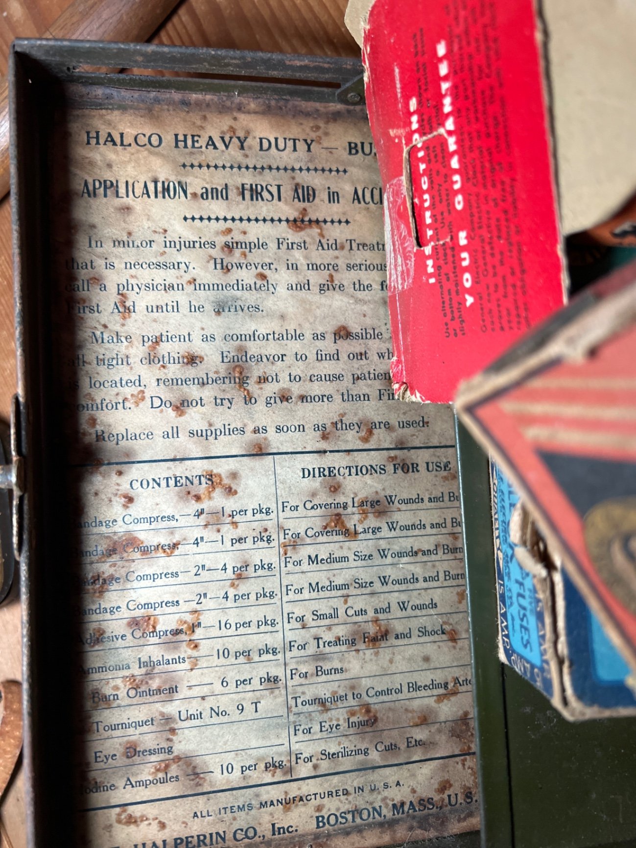 Vintage binoculars, fuse boxes, tobacco tin, and first-aid kit collection - image 9 of 9