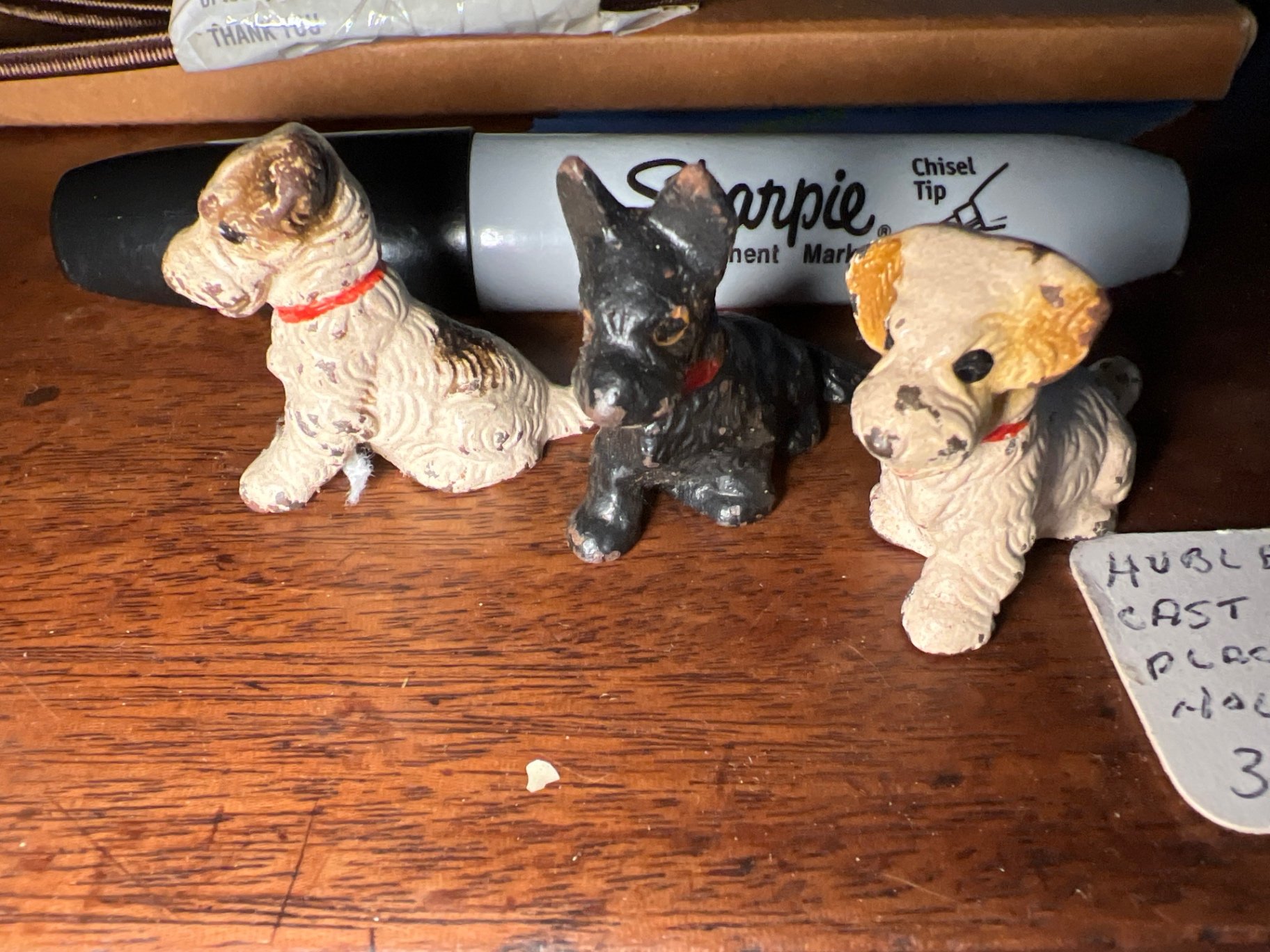 Three small dog figurines with collars - image 1 of 5