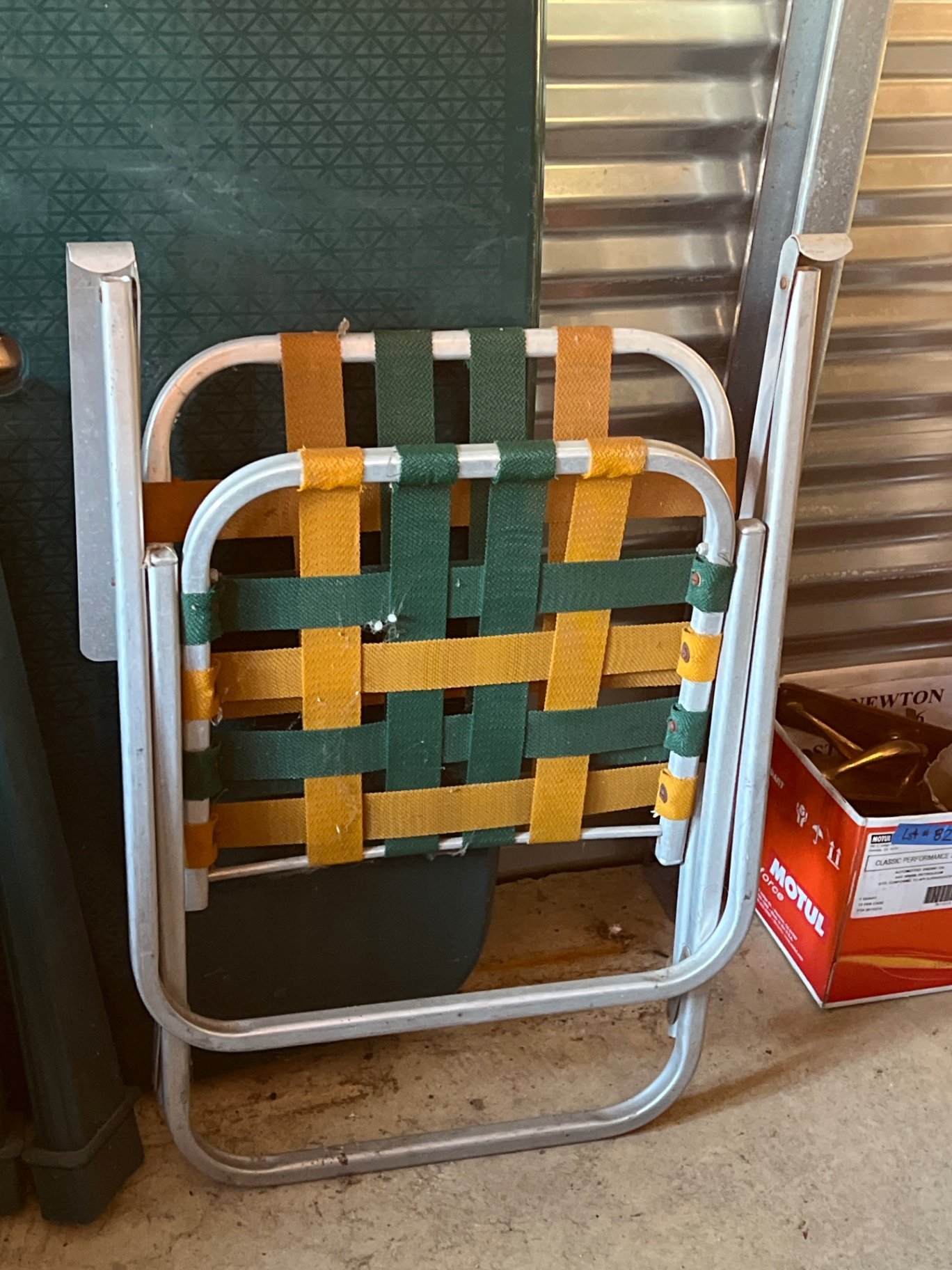 A Folding metal chair with woven straps and Plastic Table components - image 4 of 4