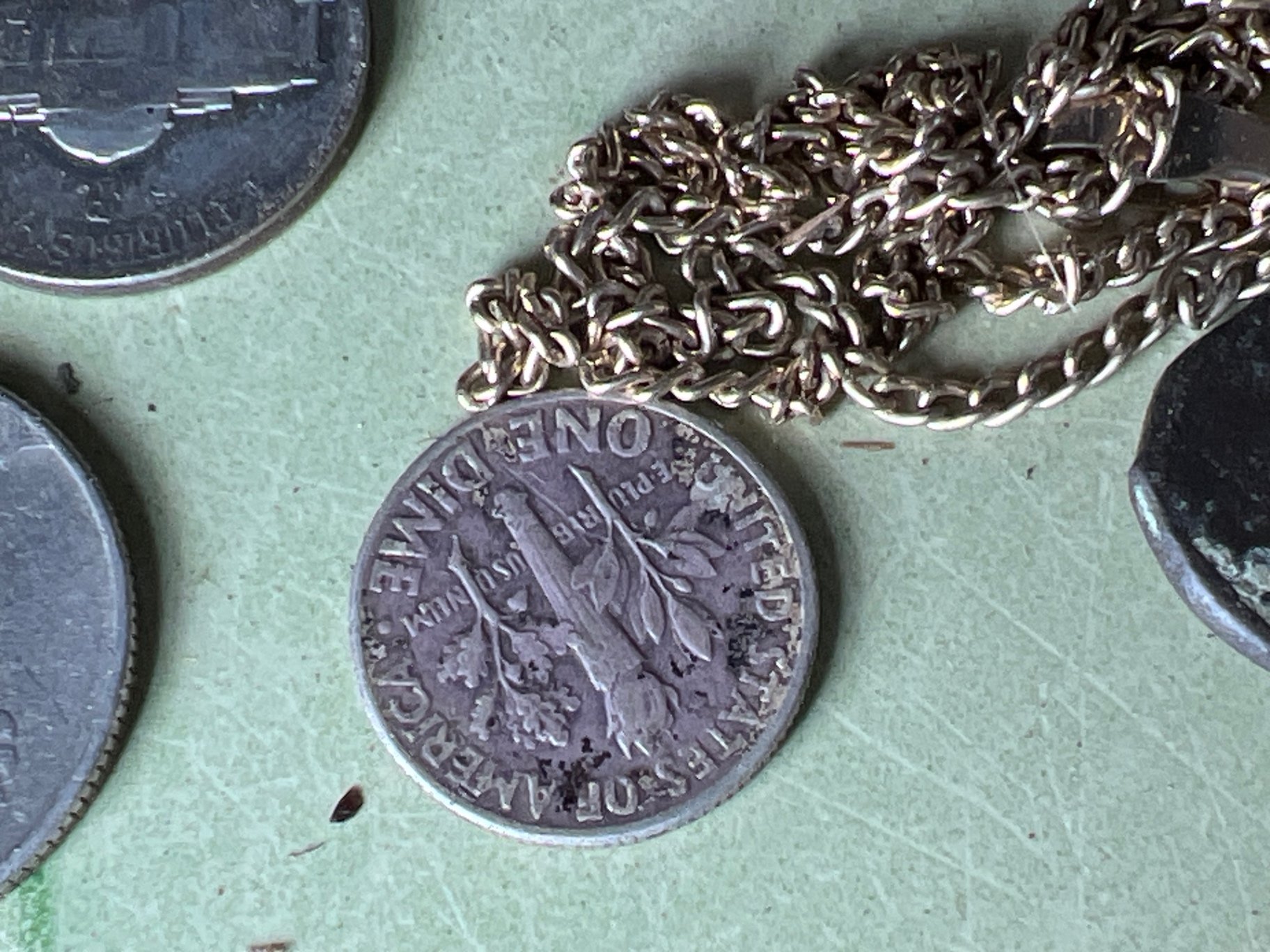 Assorted coins, pendants and small trinkets - image 4 of 10