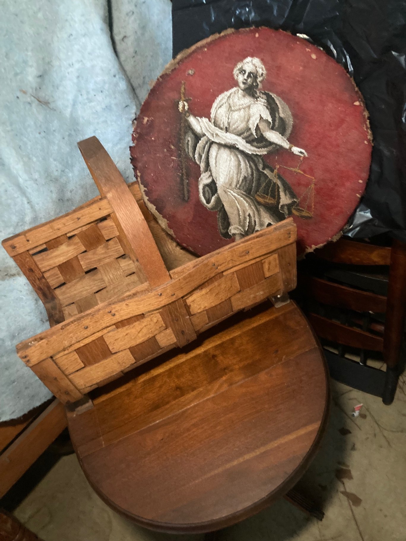Round pedestal table, wicker barrel hamper, and circular justice-themed rug - image 1 of 14