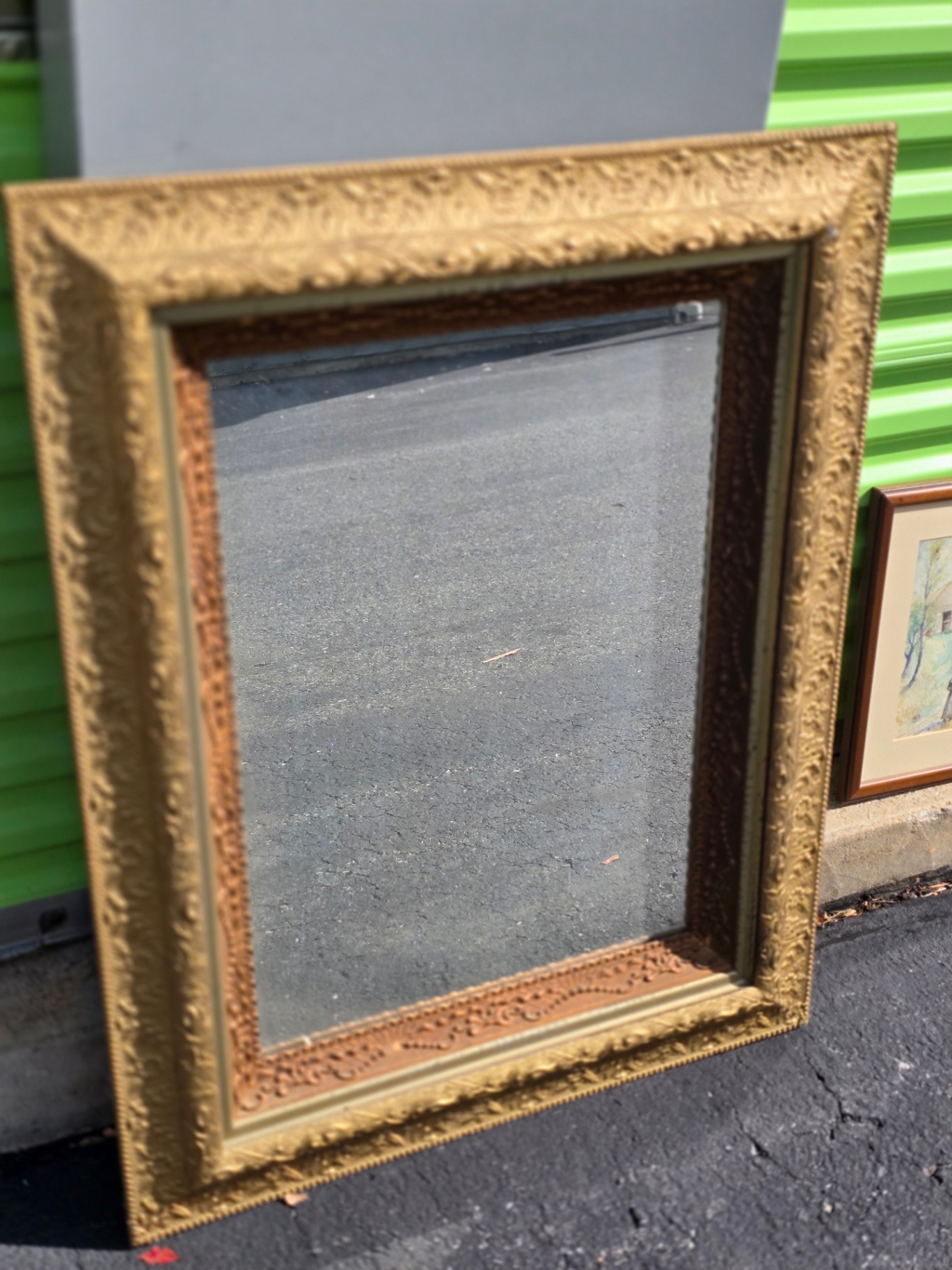 Ornate gold-framed mirror - image 1 of 13