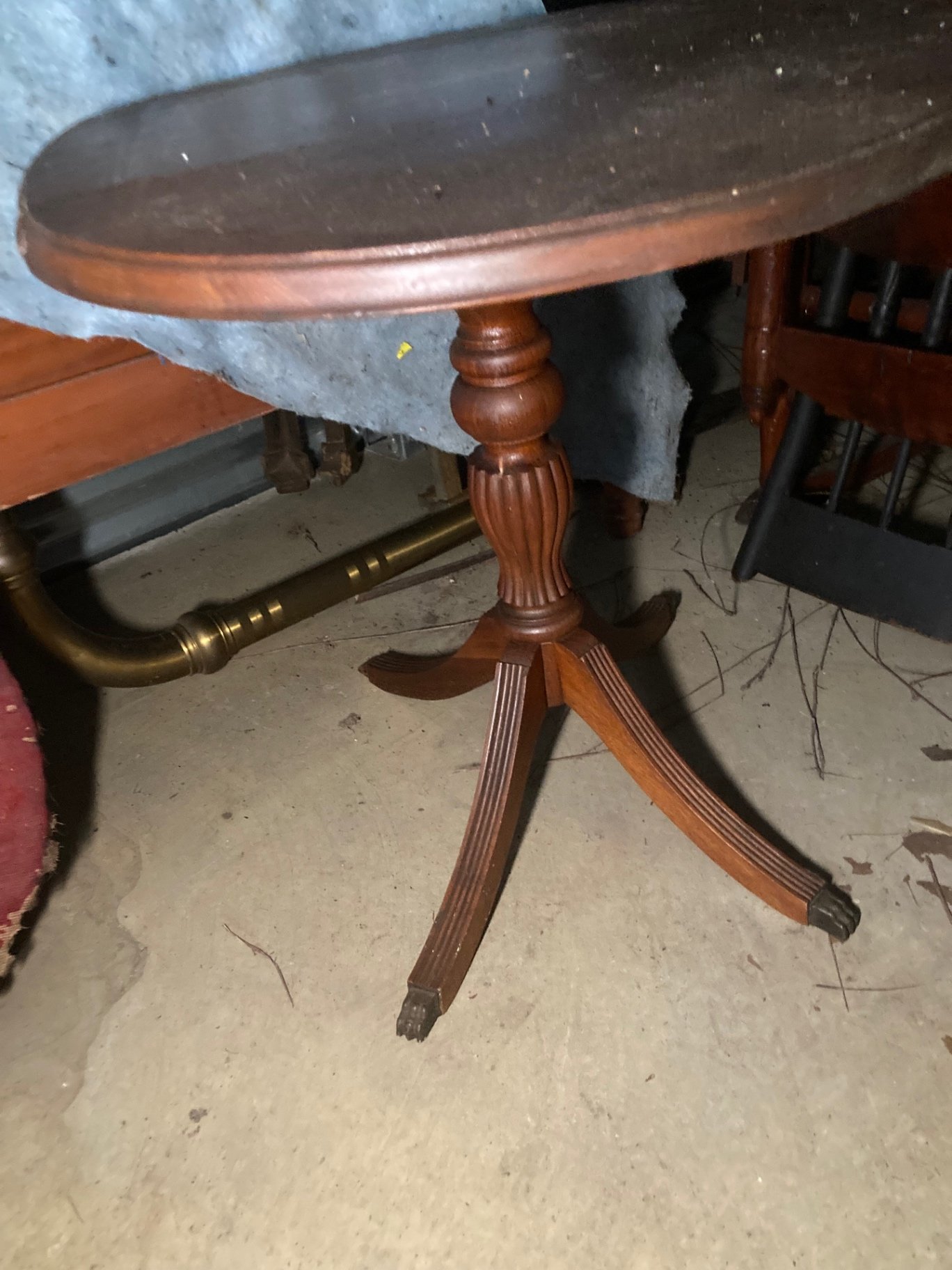 Round pedestal table, wicker barrel hamper, and circular justice-themed rug - image 5 of 14