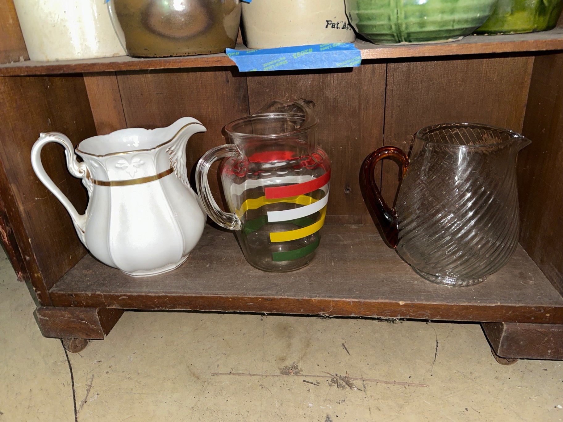 Ceramic and glass pitchers - image 1 of 6