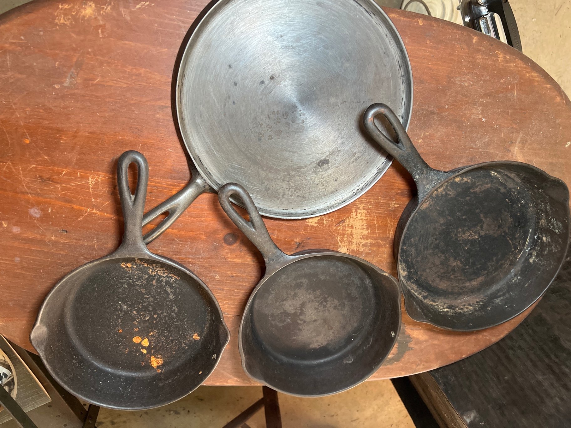 Five cast iron skillets (frying pans) with long handles - image 1 of 5