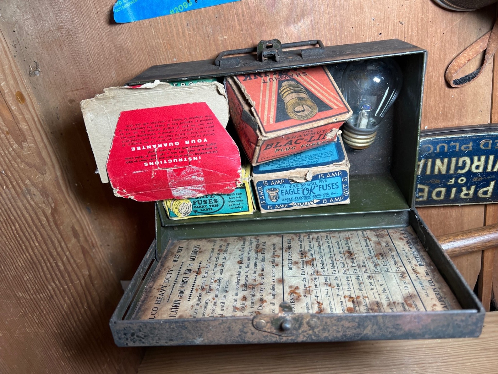 Vintage binoculars, fuse boxes, tobacco tin, and first-aid kit collection - image 4 of 9