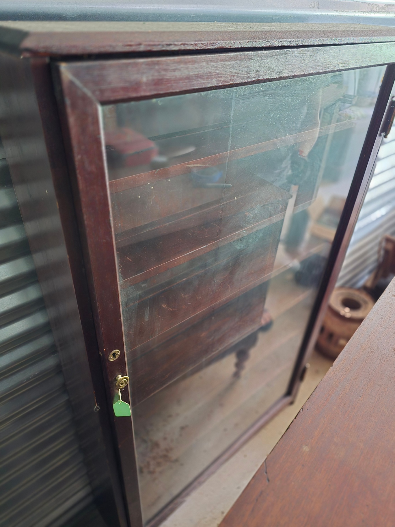 Wooden glass-front display cabinet with shelves - image 1 of 28