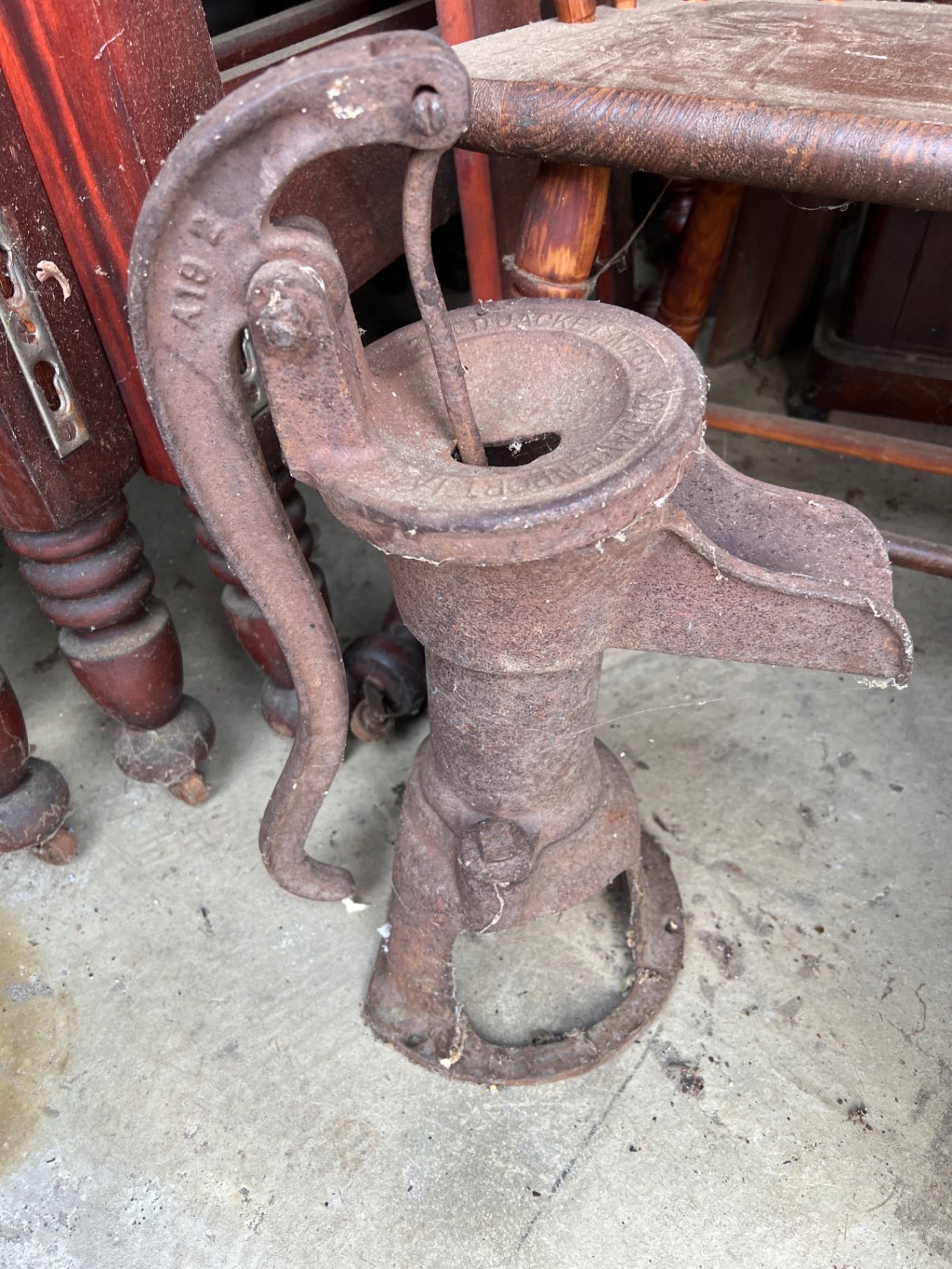 Rusty antique metal water pump and urn  - image 3 of 6