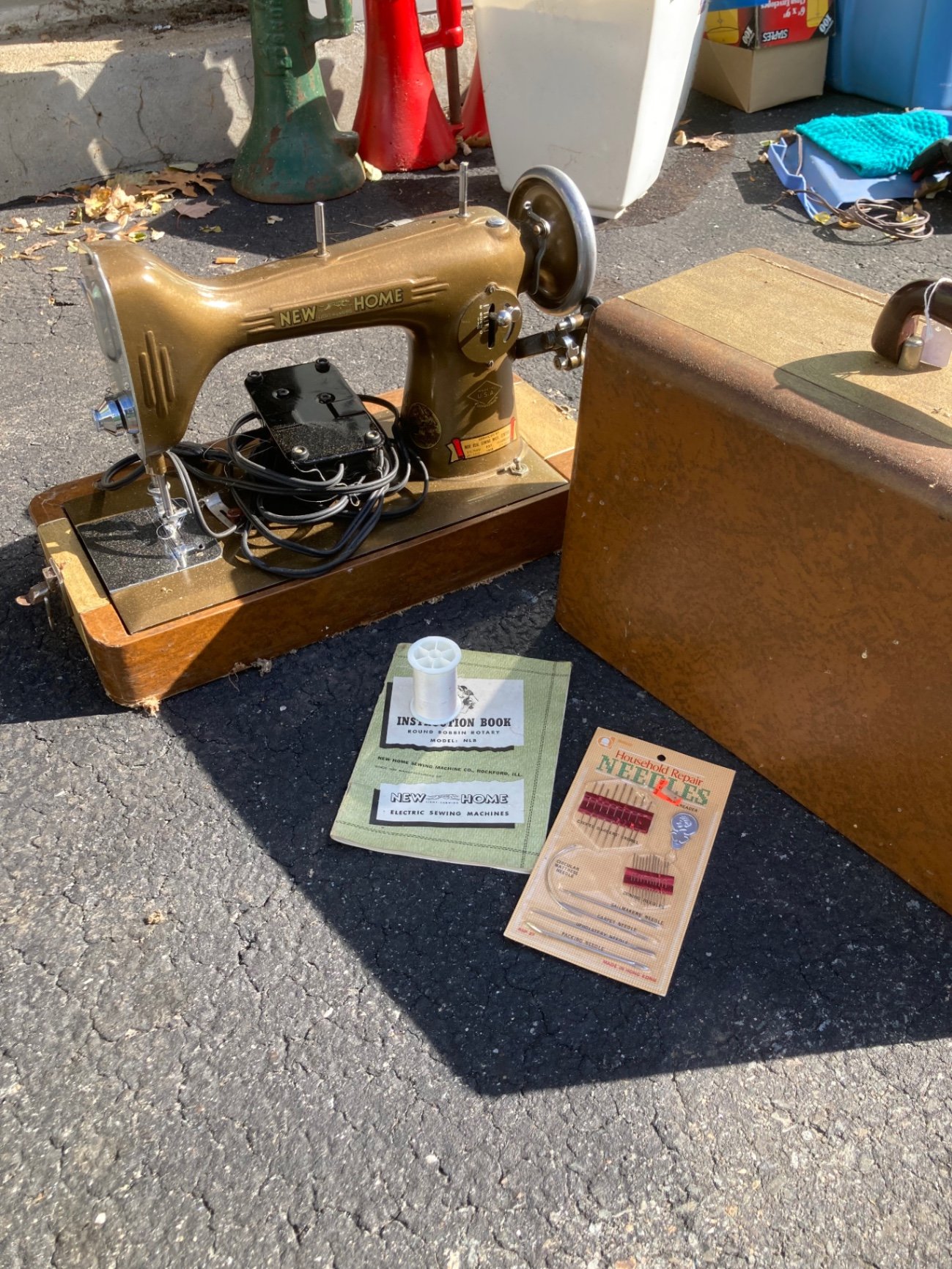 Vintage New Home sewing machine with Singer frame and accessories - image 1 of 8