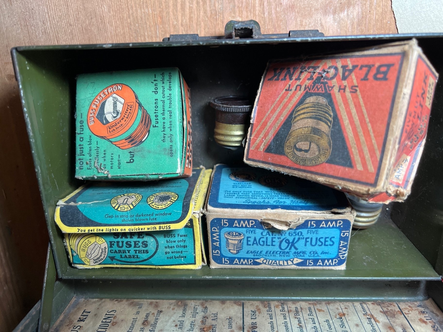 Vintage binoculars, fuse boxes, tobacco tin, and first-aid kit collection - image 2 of 9